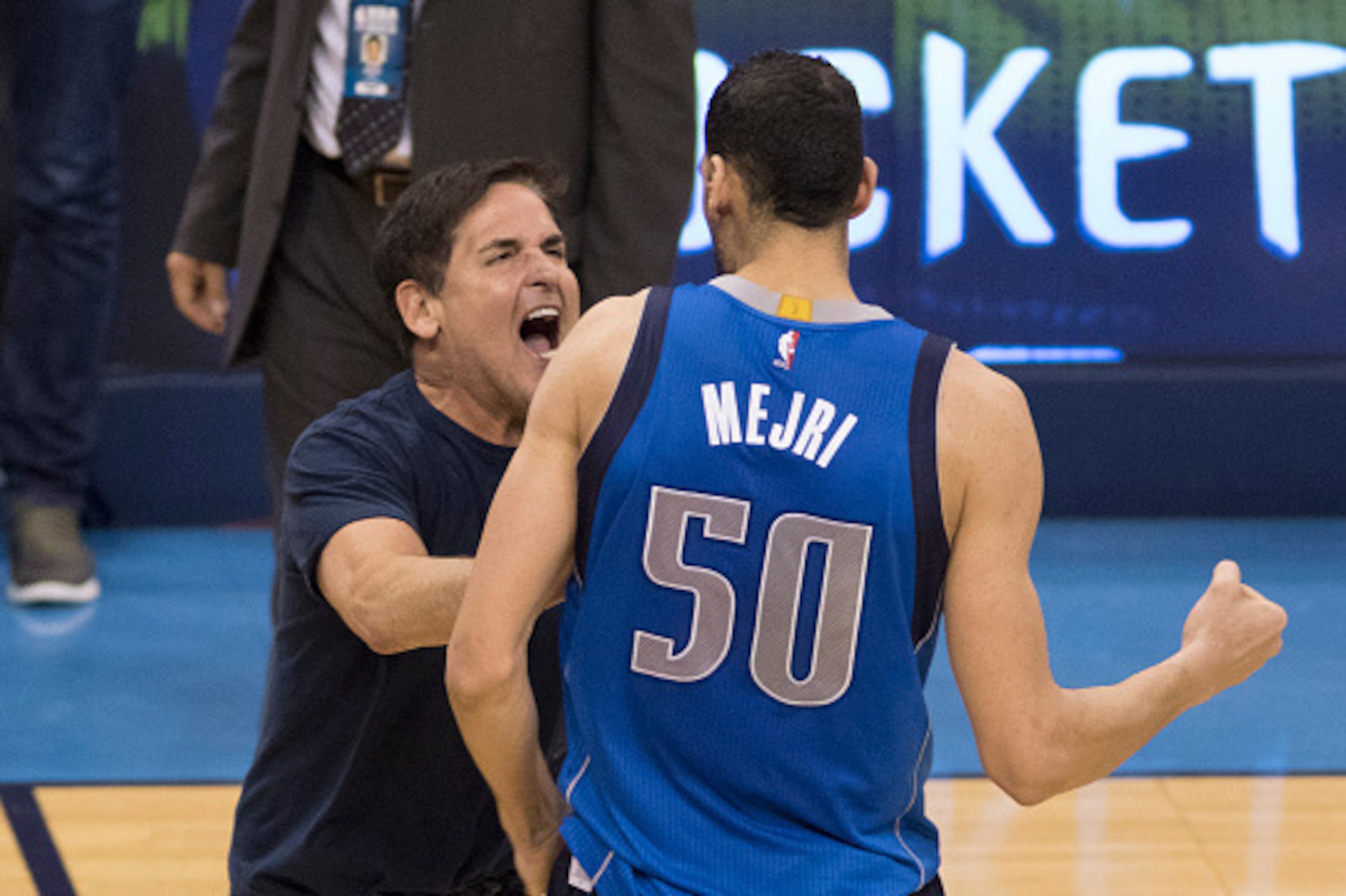 OKLAHOMA CITY, OK - APRIL 18: Mark Cuban owner of the Dallas Mavericks celebrates with Salah Mejri #50 of the Dallas Mavericks after they defeated the Oklahoma City Thunder during the second half of Game Two of the Western Conference Quarterfinals during 