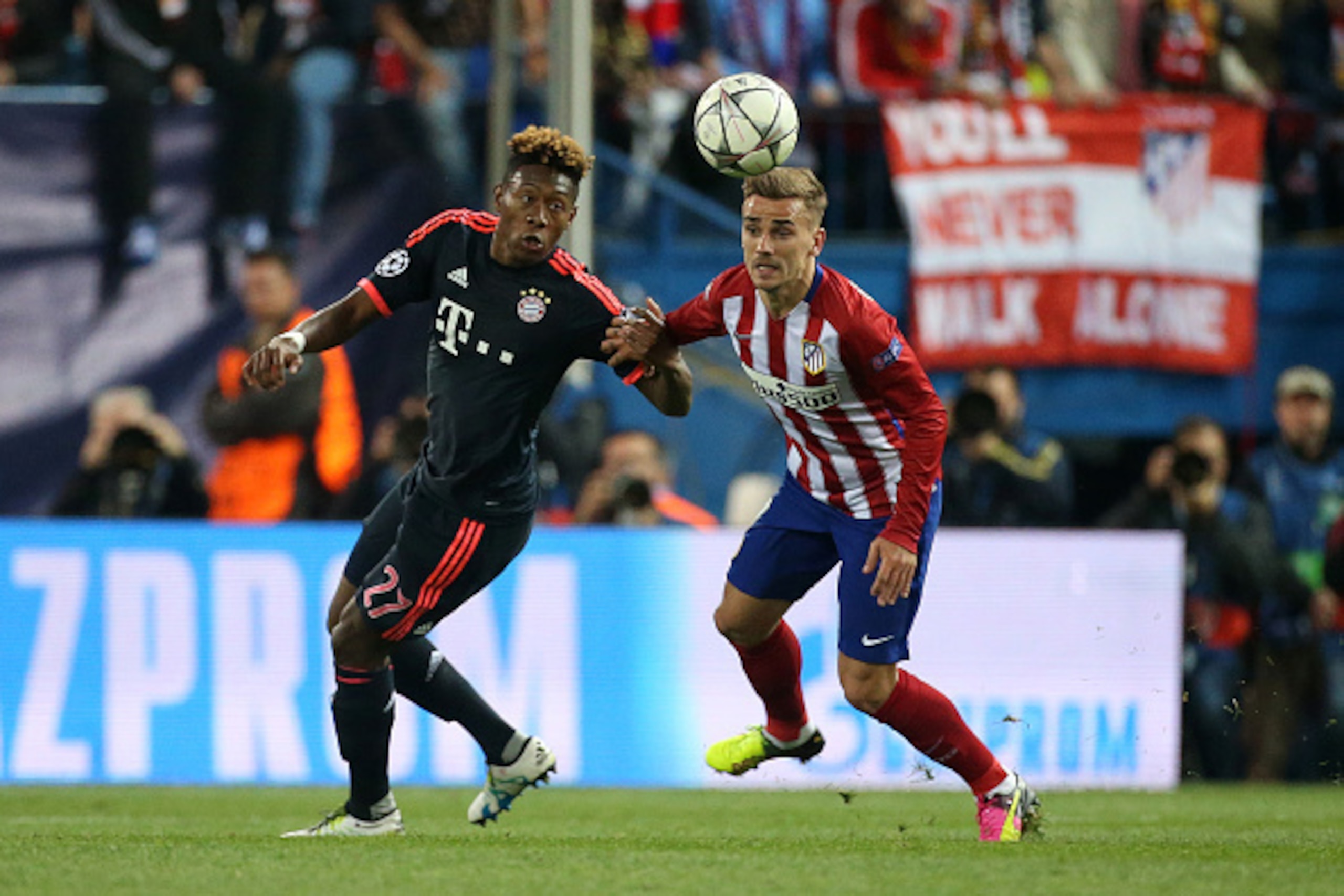 MADRID, SPAIN - APRIL 27: David Alaba of Bayern Munich and Antoine Griezmann of Atletico Madrid in action during the UEFA Champions League semi final first leg match between Club Atletico Madrid and FC Bayern Muenchen (Bayern Munich) at Estadio Vicente Ca