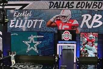 CHICAGO, IL - APRIL 28: Ezekiel Elliott walks on the stage after being drafted by the Dallas Cowboys during the 2016 NFL Draft at the Auditorium Theater on April 28, 2016 in Chicago, Illinois. (Photo by Jonathan Daniel/Getty Images)