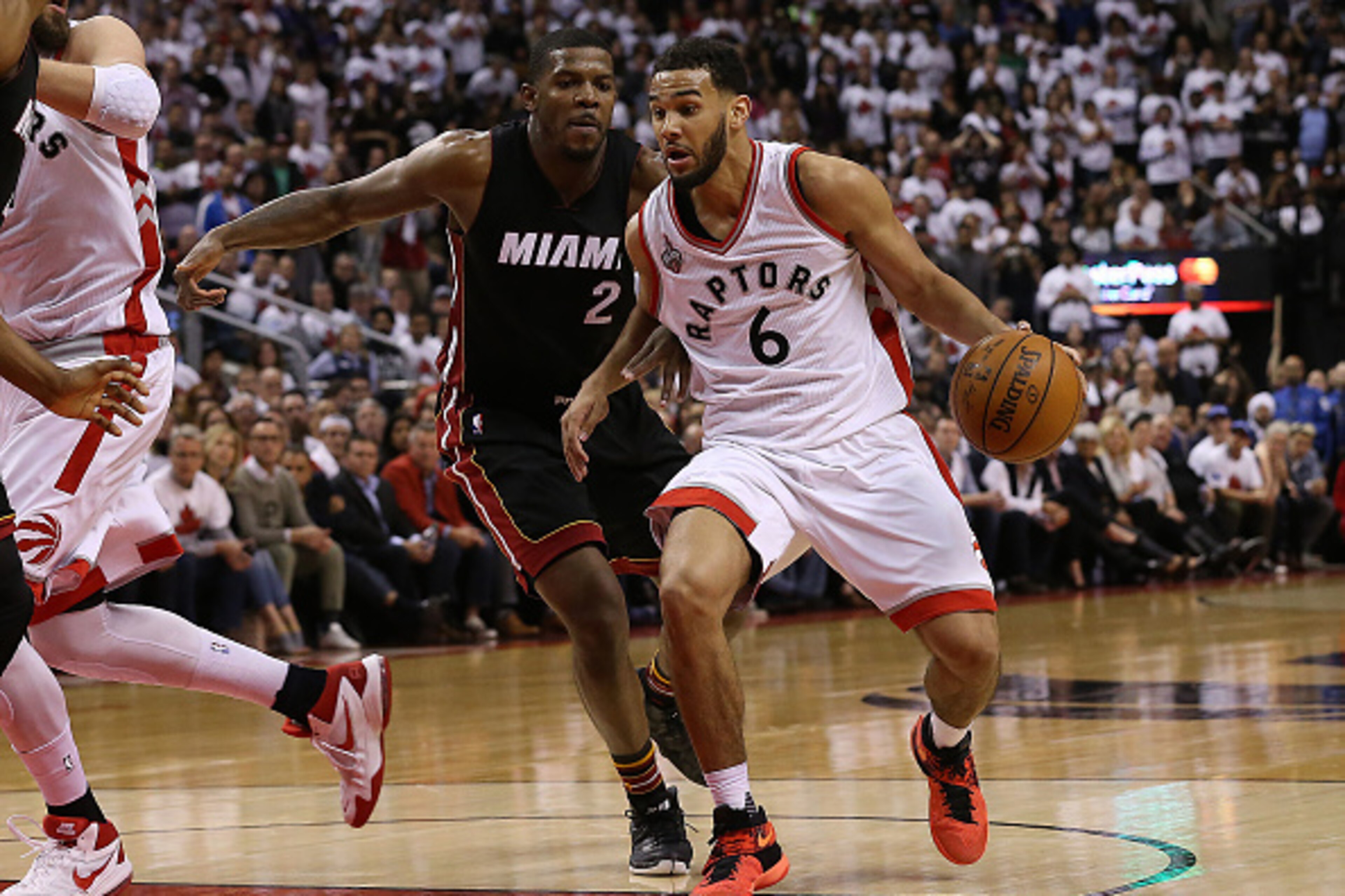 TORONTO, CAN - MAY 3: Cory Joseph #6 of the Toronto Raptors drives to the basket past Joe Johnson #2 of the Miami Heat during Game One of the NBA Eastern Conference Semi Finals at Air Canada Centre on May 3, 2016 in Toronto, Ontario, Canada. NOTE TO USER: TORONTO, CAN - MAY 3: Cory Joseph #6 of the Toronto Raptors drives to the basket past Joe Johnson #2 of the Miami Heat during Game One of the NBA Eastern Conference Semi Finals at Air Canada Centre on May 3, 2016 in Toronto, Ontario, Canada. NOTE TO USER: