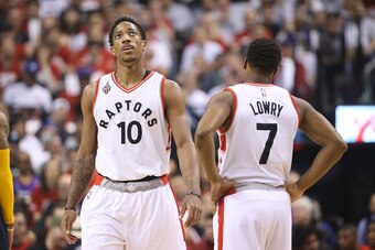 TORONTO, CANADA - APRIL 16: DeMar DeRozan #10 of the Toronto Raptors and Kyle Lowry #7 of the Toronto Raptors look on against the Indiana Pacers in Game One of the Eastern Conference Quarterfinals during the 2016 NBA Playoffs on April 16, 2016 at the Air 