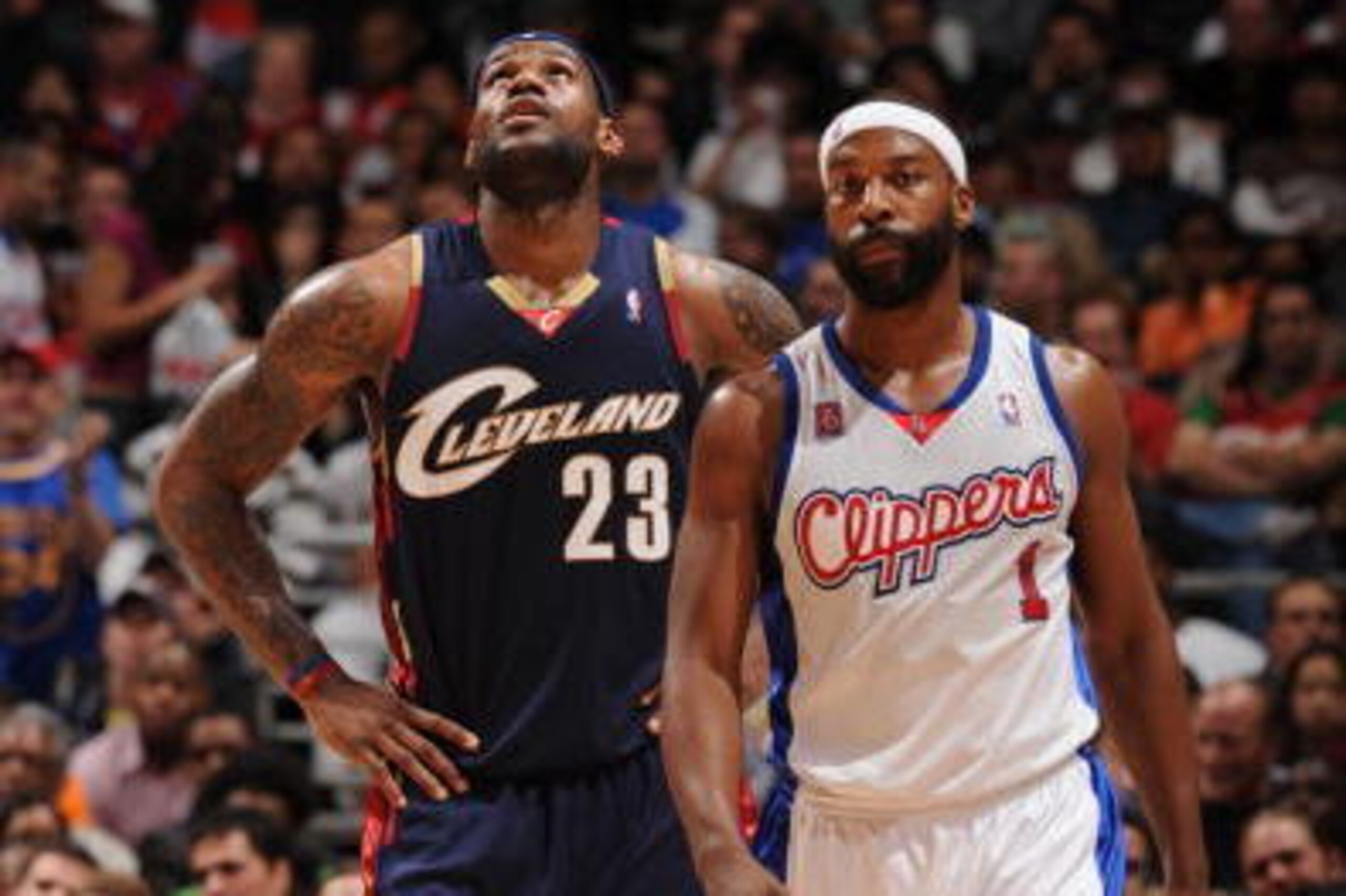 LOS ANGELES - MARCH 10:  LeBron James #23 of the Cleveland Cavaliers and Baron Davis #1 of the Los Angeles Clippers look on during their game at Staples Center on March 10, 2009 in Los Angeles, California. NOTE TO USER: User expressly acknowledges and agr