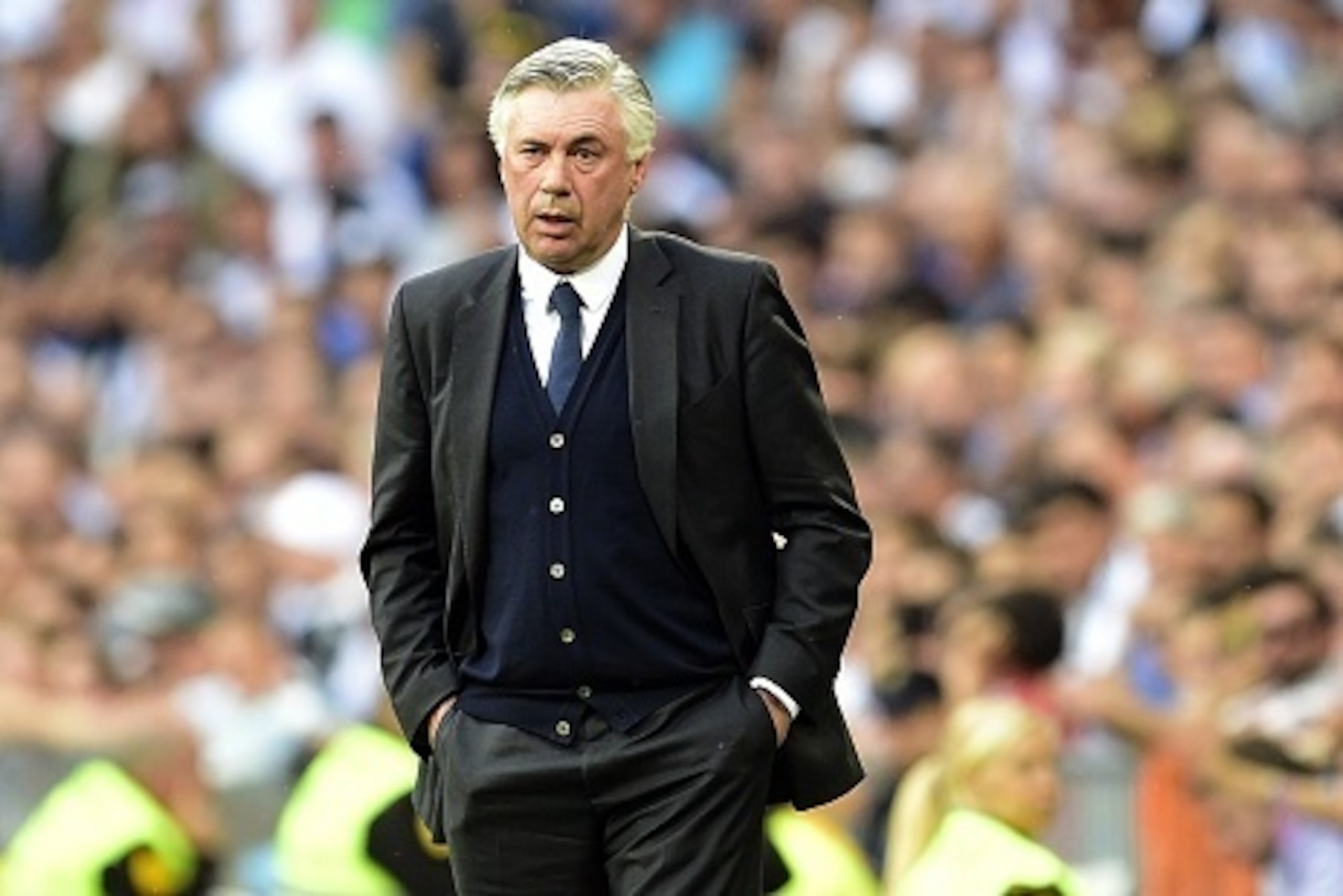 Real Madrid's Italian coach Carlo Ancelotti attends the Spanish league football match Real Madrid CF vs Valencia CF at the Santiago Bernabeu stadium in Madrid on May 9, 2015.   AFP PHOTO/ GERARD JULIEN        (Photo credit should read GERARD JULIEN/AFP/Ge