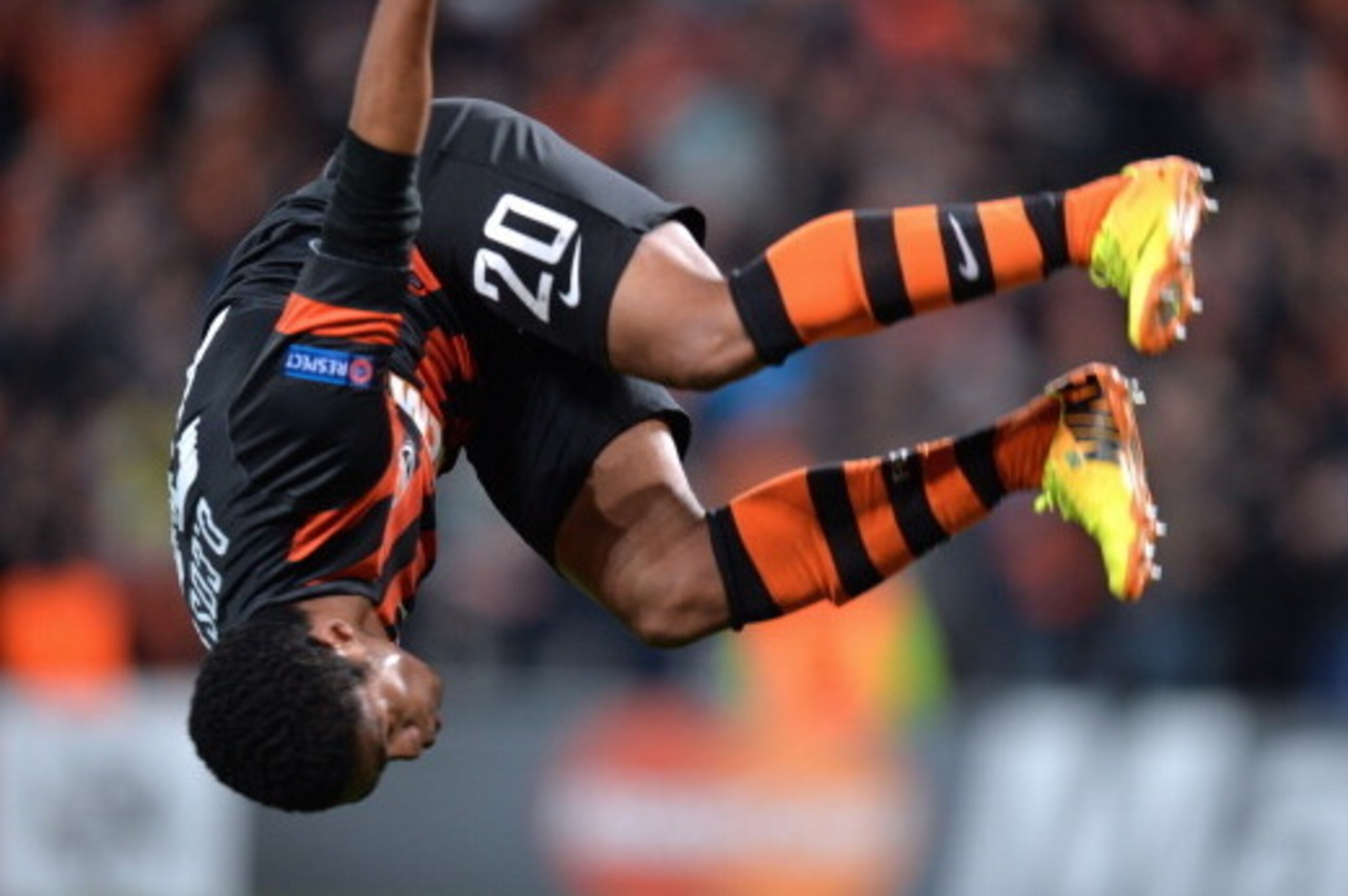 FC Shakhtar Donetsk's Douglas Costa celebrates after he scored against Real Sociedad during their UEFA Champions League Group A football match in Donetsk on November 27, 2013. AFP PHOTO/ SERGEI SUPINSKY        (Photo credit should read SERGEI SUPINSKY/AFP