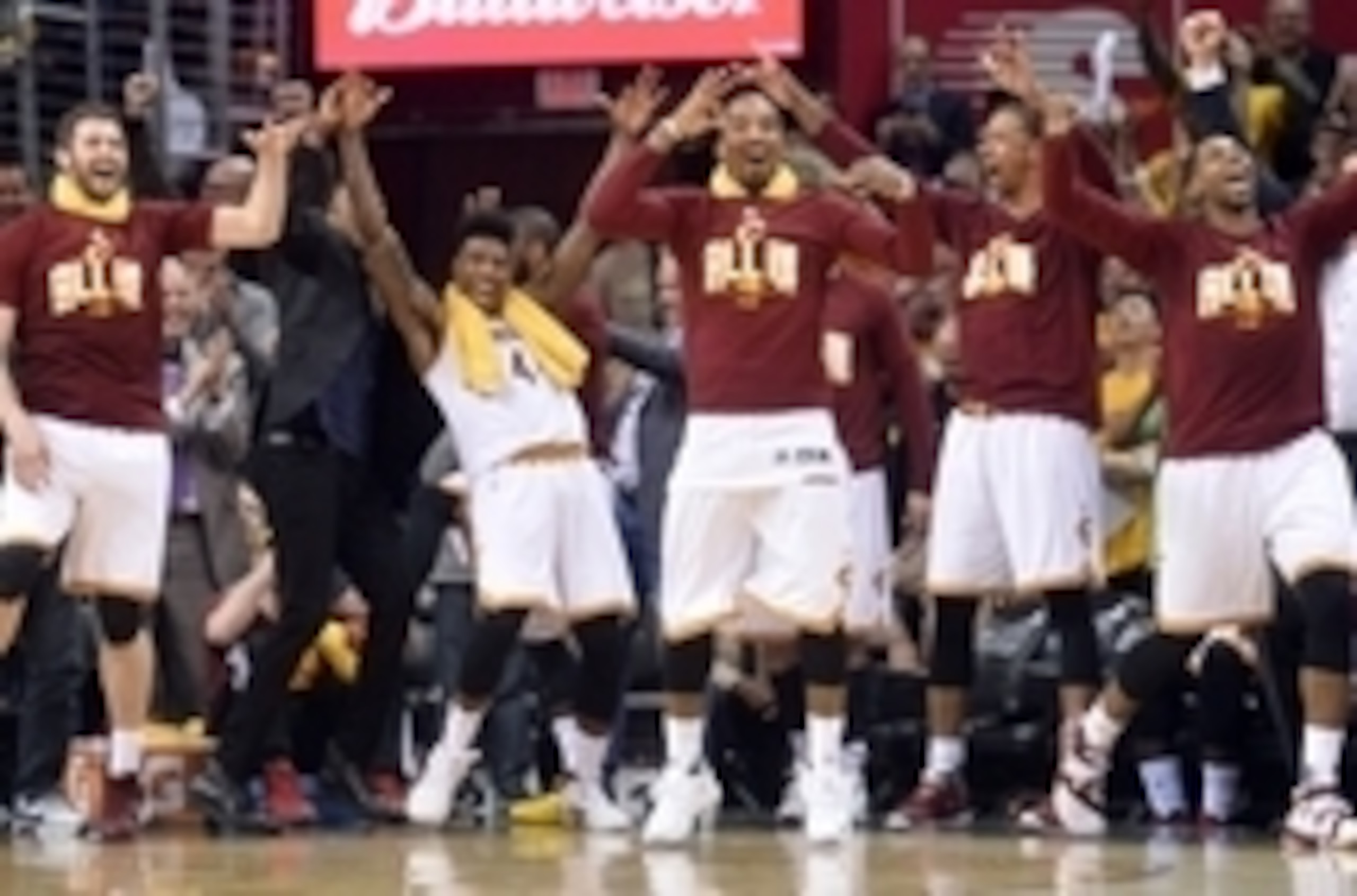 May 4, 2016; Cleveland, OH, USA; The Cleveland Cavaliers bench, including forward Kevin Love (0), guard Iman Shumpert (4), guard J.R. Smith (5), and center Tristan Thompson (13) celebrate Cleveland Cavaliers guard Mo Williams' (52) three-pointer during th