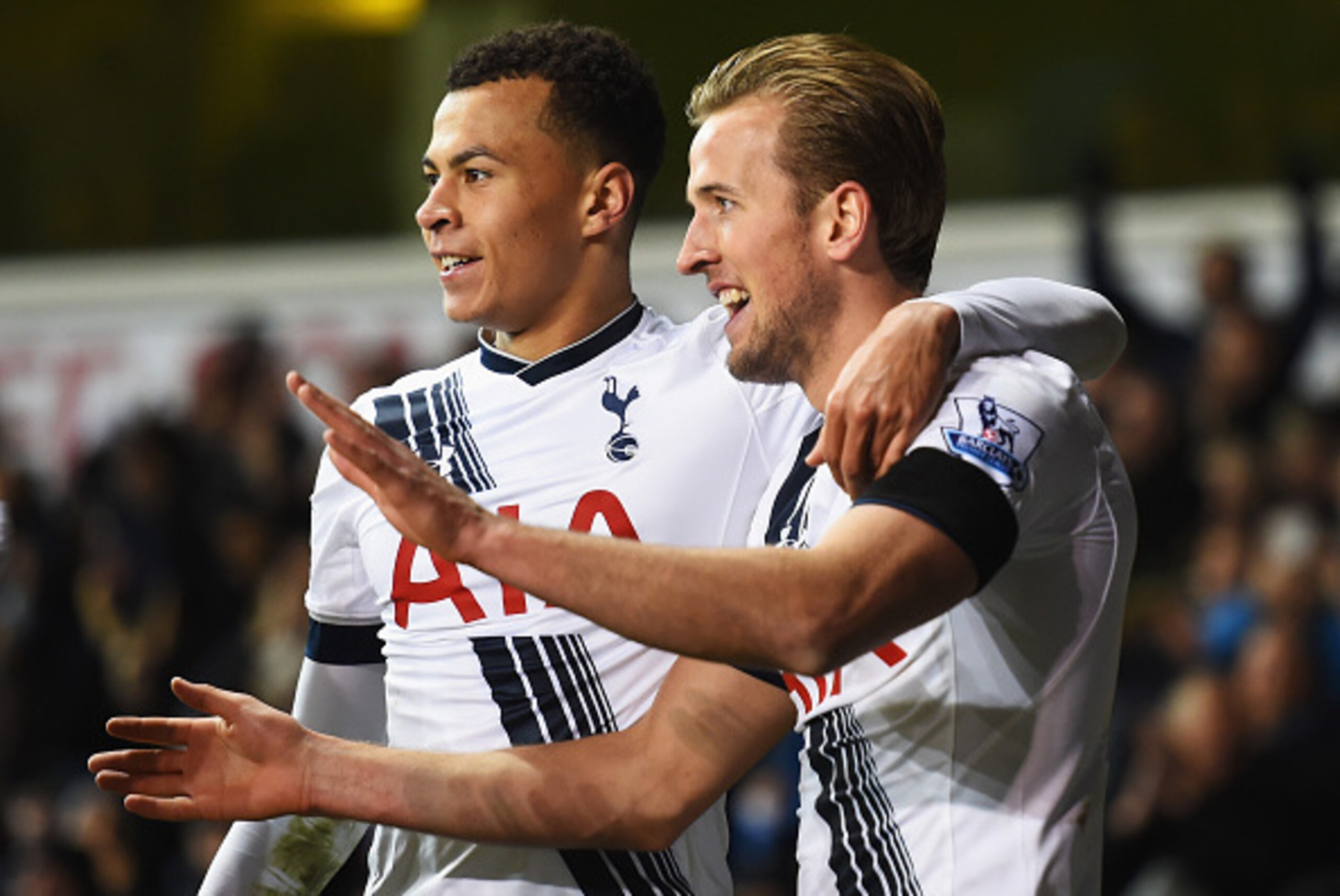 LONDON, ENGLAND - NOVEMBER 22:  Harry Kane (R) of Tottenham Hotspur celebrates scoring his teams third goal with Dele Alli of Tottenham Hotspur during the Barclays Premier League match between Tottenham Hotspur and West Ham United at White Hart Lane on No