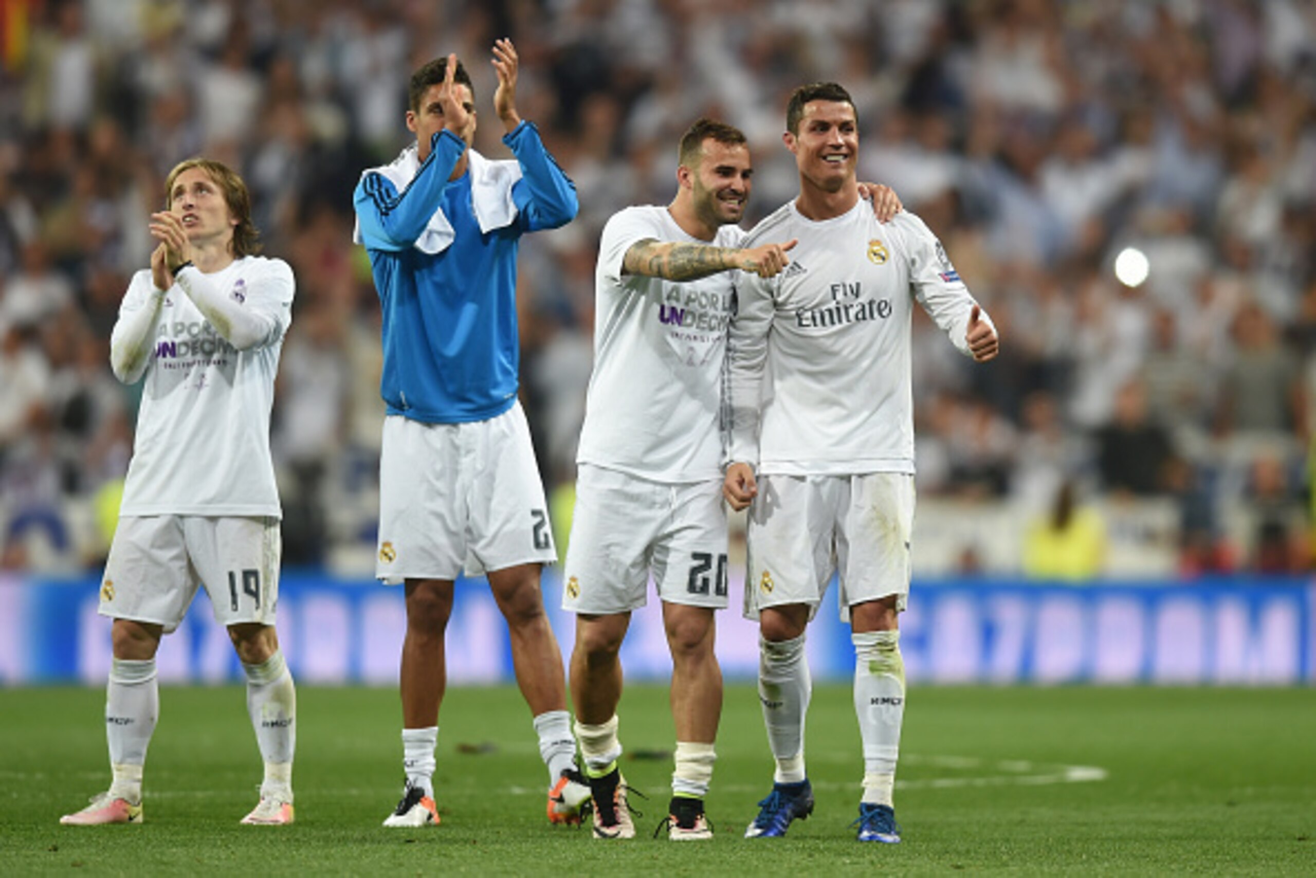 MADRID, ENGLAND - MAY 04: Cristiano Ronaldo of Real Madrid and Jese of Real Madrid celebrate  during the UEFA Champions League semi final, second leg match between Real Madrid and Manchester City FC at Estadio Santiago Bernabeu on May 4, 2016 in Madrid, S
