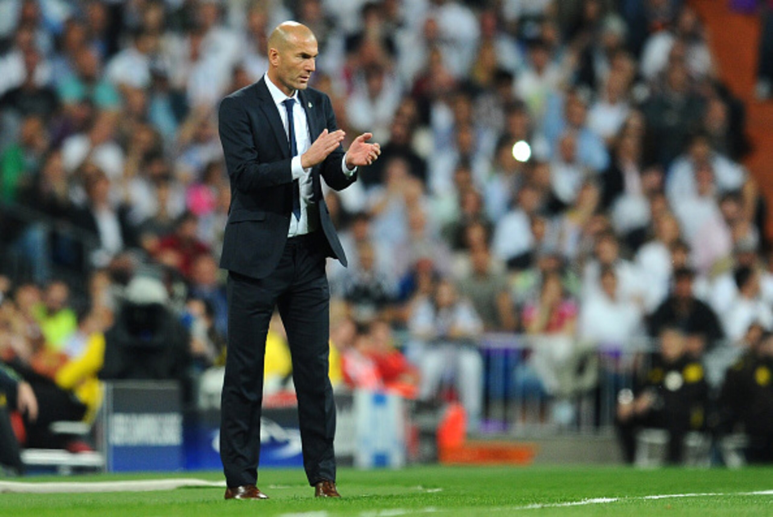 MADRID, SPAIN - MAY 04:  Zinedine Zidane the head coach of Real Madrid looks on during the UEFA Champions League semi final, second leg match between Real Madrid and Manchester City FC at Estadio Santiago Bernabeu on May 4, 2016 in Madrid, Spain.  (Photo 
