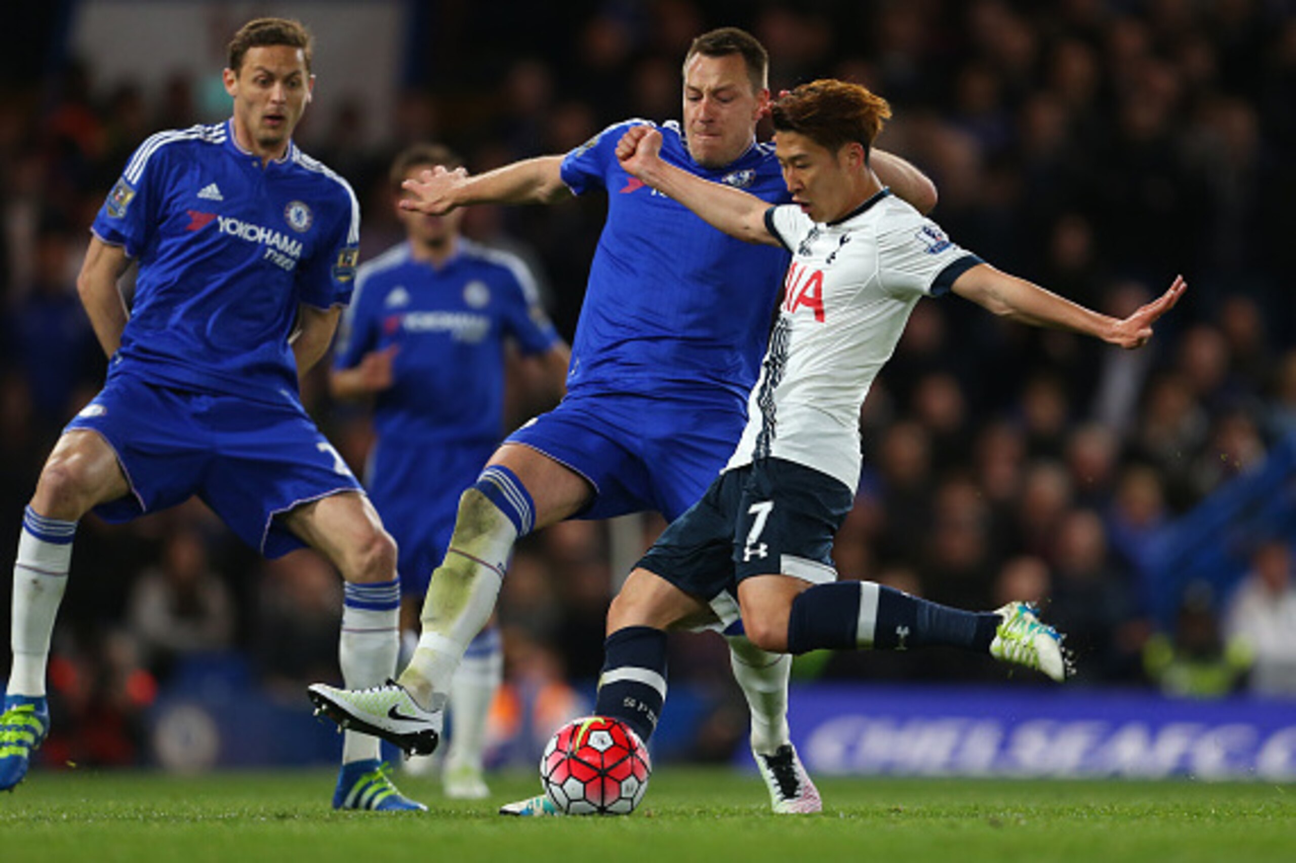 LONDON, ENGLAND - MAY 02 : Son Heung-Min of Tottenham Hotspur shoots past John Terry of Chelsea during the Barclays Premier League match between Chelsea and Tottenham Hotspur at Stamford Bridge on May 2, 2016 in London, England. (Photo by Catherine Ivil LONDON, ENGLAND - MAY 02 : Son Heung-Min of Tottenham Hotspur shoots past John Terry of Chelsea during the Barclays Premier League match between Chelsea and Tottenham Hotspur at Stamford Bridge on May 2, 2016 in London, England. (Photo by Catherine Ivil