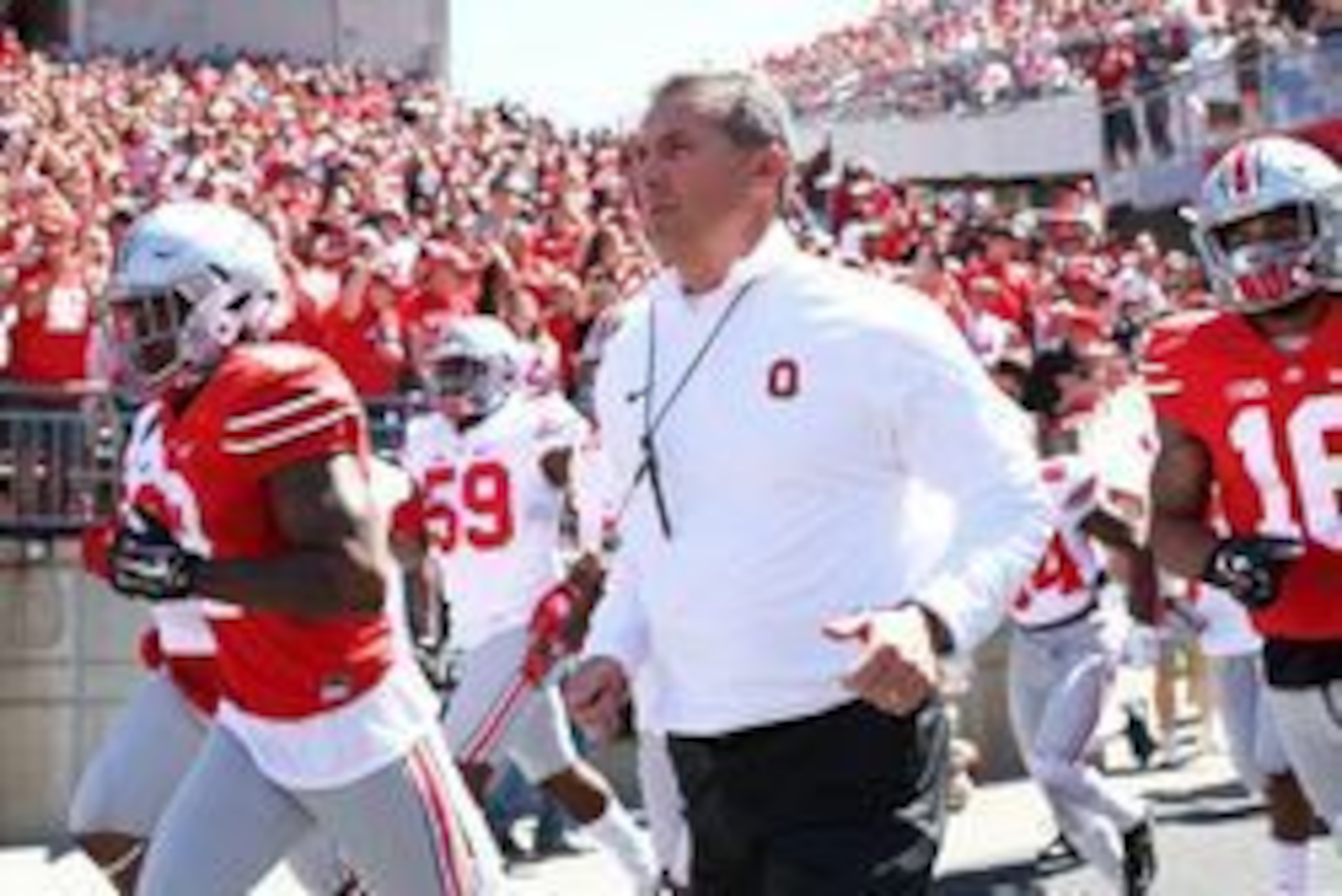 Apr 16, 2016; Columbus, OH, USA; Ohio State head coach Urban Meyer leads the Scarlet and Gray teams onto the field prior to the spring game at Ohio Stadium. Mandatory Credit: Aaron Doster-USA TODAY Sports Apr 16, 2016; Columbus, OH, USA; Ohio State head coach Urban Meyer leads the Scarlet and Gray teams onto the field prior to the spring game at Ohio Stadium. Mandatory Credit: Aaron Doster-USA TODAY Sports