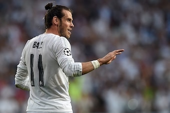Real Madrid's Welsh forward Gareth Bale gestures at the end of the UEFA Champions League semi-final second leg football match Real Madrid CF vs Manchester City FC at the Santiago Bernabeu stadium in Madrid, on May 4, 2016. / AFP / PAUL ELLIS        (Photo