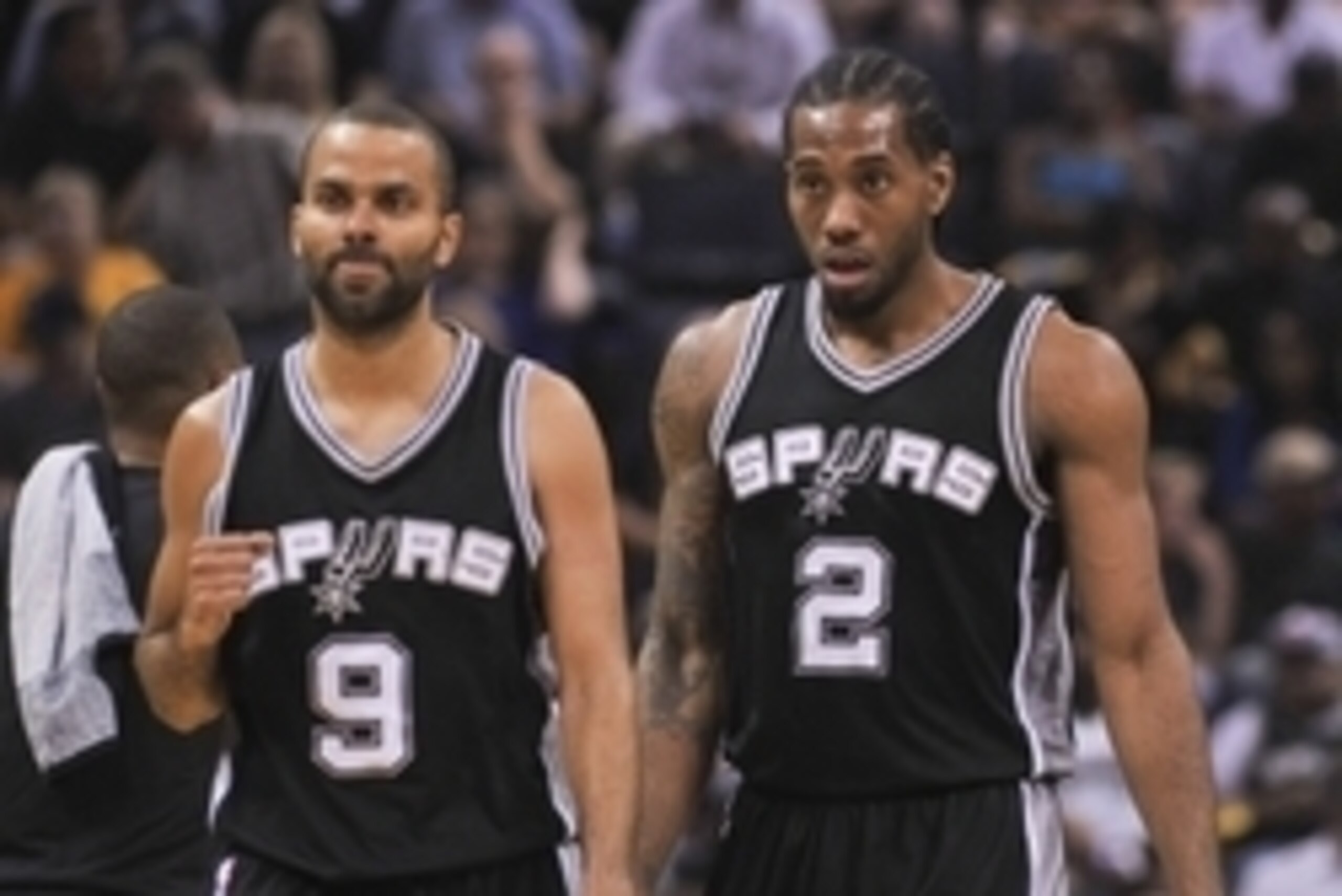 Apr 24, 2016; Memphis, TN, USA; San Antonio Spurs guard Tony Parker (9) and forward Kawhi Leonard (2) during the first half against the Memphis Grizzlies in game four of the first round of the NBA Playoffs at FedExForum. Mandatory Credit: Justin Ford-USA 