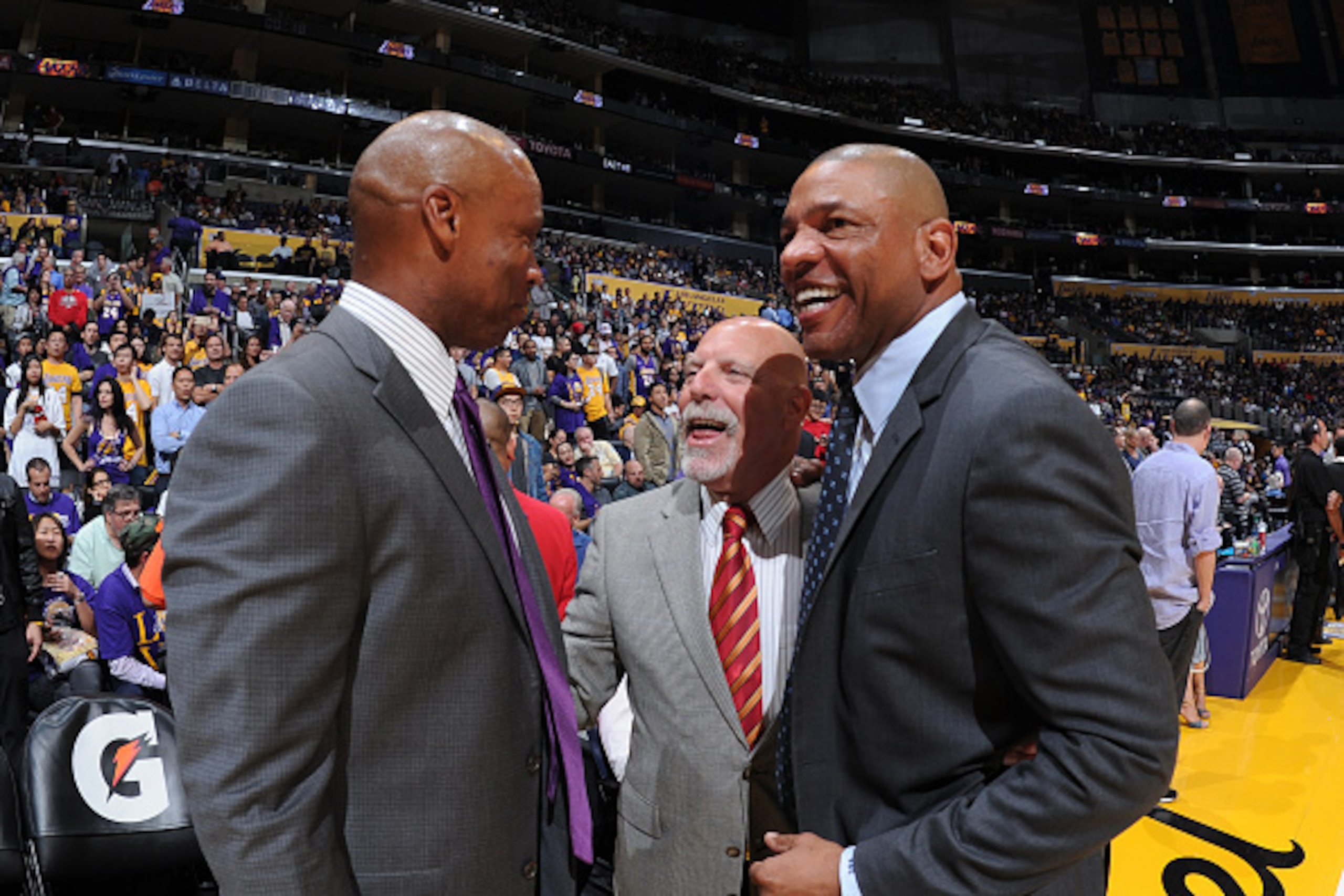 LOS ANGELES, CA - APRIL 6: Byron Scott and Gary Vitti of the Los Angeles Lakers are seen with Doc Rivers of the Los Angeles Clippers before the game at STAPLES Center on April 6, 2016 in Los Angeles, California. NOTE TO USER: User expressly acknowledges a