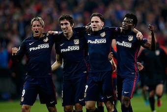 MUNICH, GERMANY - MAY 03:  (L-R) Fernando Torres, Stefan Savic, Saul Niguez and Thomas Partey of Atletico Madrid celebrate after the UEFA Champions League semi final second leg match between FC Bayern Muenchen and Club Atletico de Madrid at Allianz Arena 