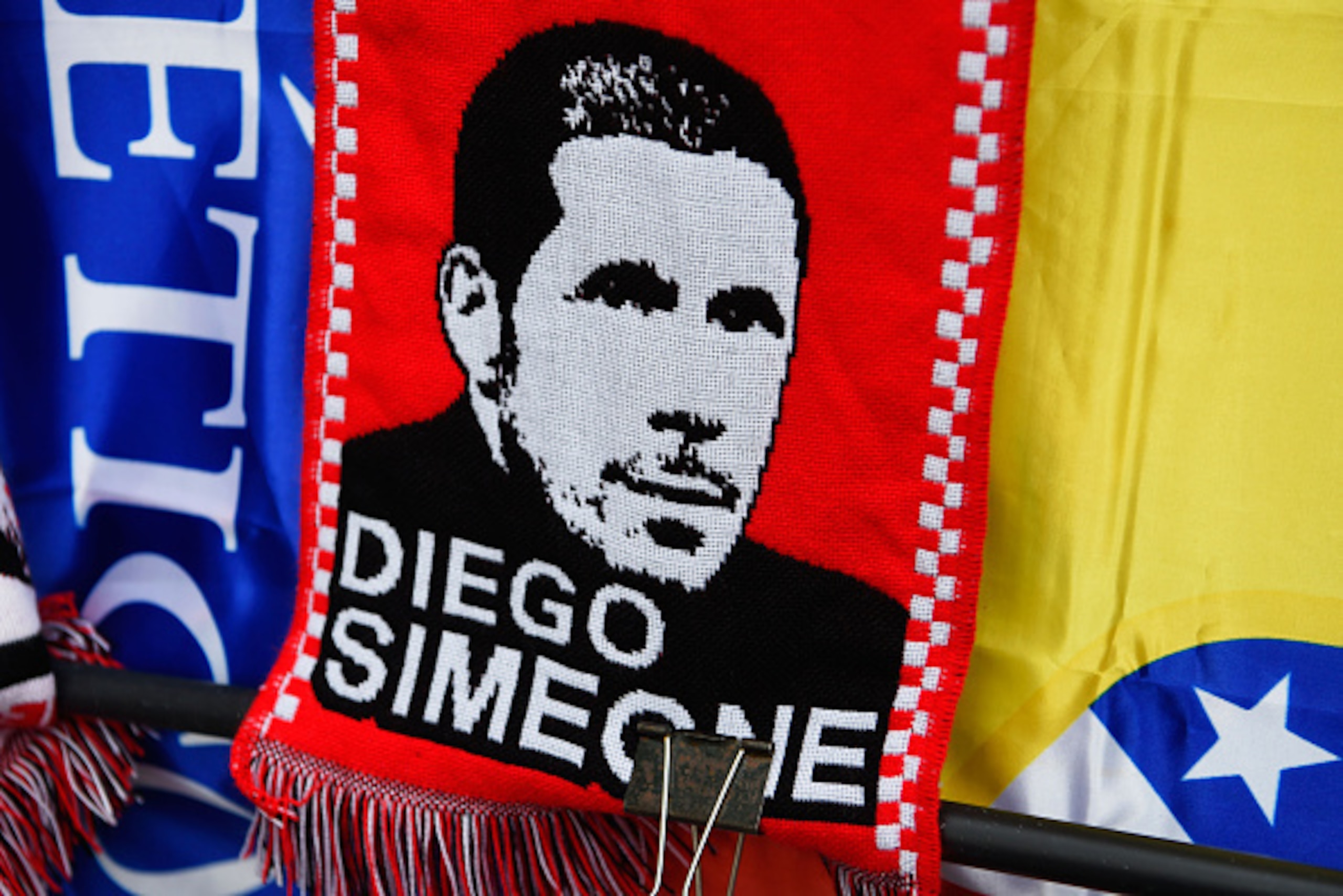 MADRID, SPAIN - APRIL 27: An image of Diego Simeone head coach of Atletico Madrid is seen on a scarf prior to the UEFA Champions League semi final first leg match between Club Atletico de Madrid and FC Bayern Muenchen at Vincente Calderon on April 27, 20 MADRID, SPAIN - APRIL 27: An image of Diego Simeone head coach of Atletico Madrid is seen on a scarf prior to the UEFA Champions League semi final first leg match between Club Atletico de Madrid and FC Bayern Muenchen at Vincente Calderon on April 27, 20