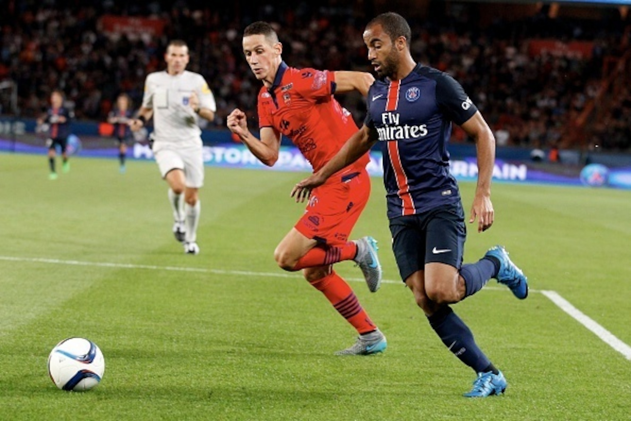 PARIS, FRANCE - AUGUST 16:  Lucas Moura (R) of Paris Saint-Germain during the French  Ligue 1 between Paris Saint-Germain FC and GFC Ajaccio at Parc Des Princes on August 16, 2015 in Paris, France.  (Photo by Xavier Laine/Getty Images)