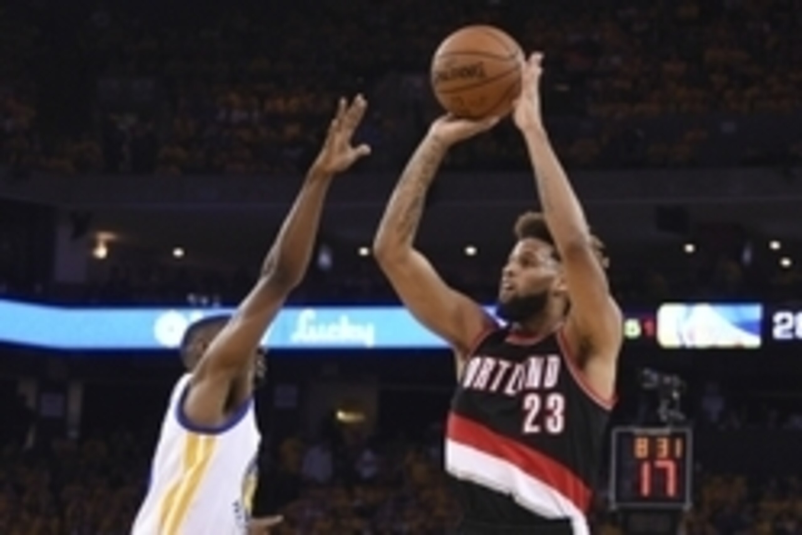 May 3, 2016; Oakland, CA, USA; Portland Trail Blazers guard Allen Crabbe (23) shoots the basketball against Golden State Warriors guard Ian Clark (21) during the second quarter in game two of the second round of the NBA Playoffs at Oracle Arena. Mandatory
