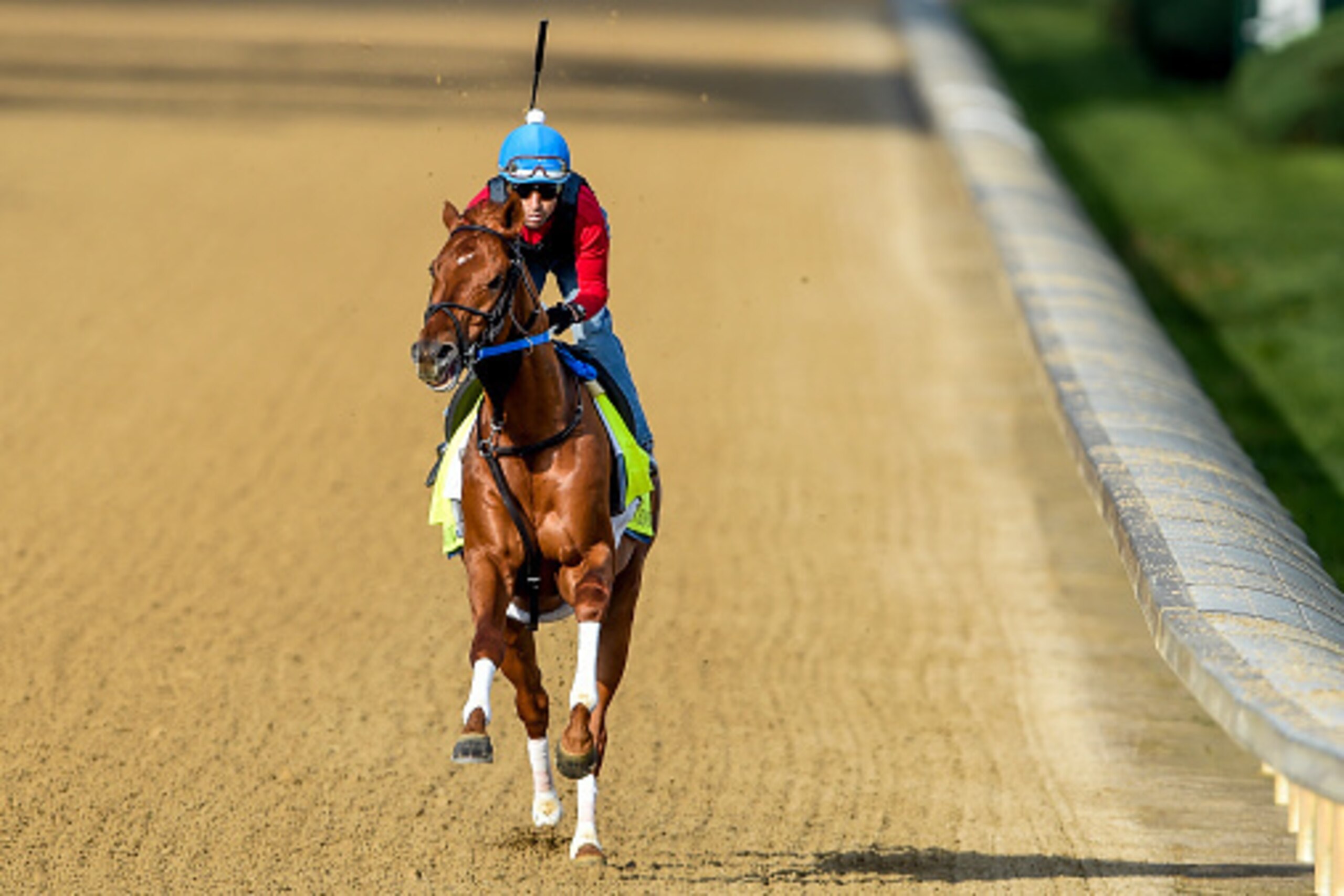 LOUISVILLE, KY - MAY 02: Gun Runner, with regular rider Florent Geroux (trained by Steven Asmussen and owned by Winchell Thoroughbreds LLC and Three Chimneys Farm),exercises and prepares during morning workouts for the Kentucky Derby and Kentucky Oaks at 