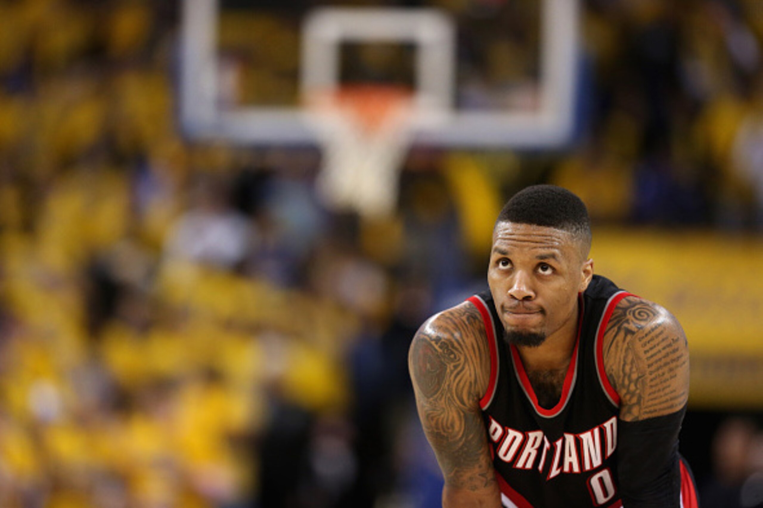 OAKLAND, CA - MAY 03:  Damian Lillard #0 of the Portland Trail Blazers stands on the court during their game against the Golden State Warriors in Game Two of the Western Conference Semifinals during the 2016 NBA Playoffs on May 3, 2016 at Oracle Arena in 