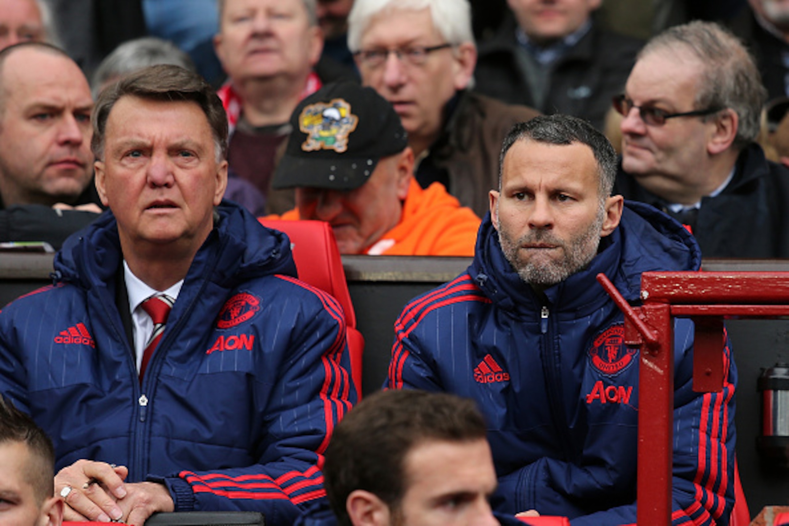 MANCHESTER, ENGLAND - MAY 01:  Manchester United Manager Louis van Gaal
 looks on with Assistant Ryan Giggs (R) during the Barclays Premier League match between Manchester United and Leicester City at Old Trafford on May 1, 2016 in Manchester, United King