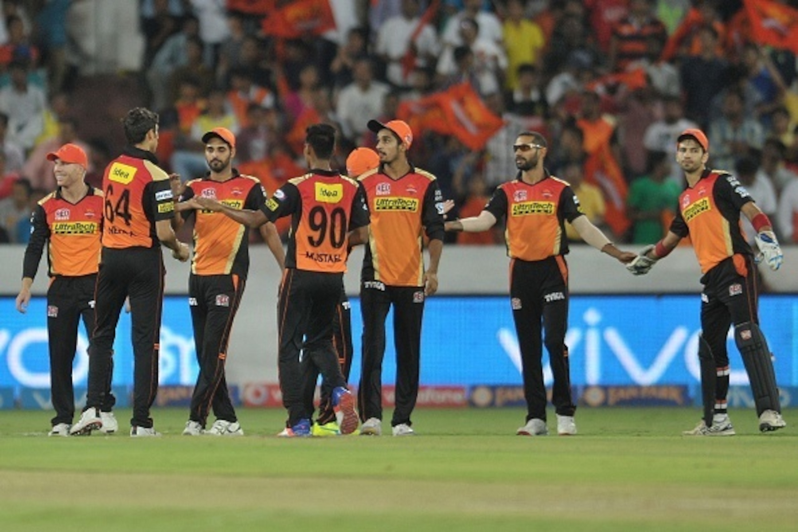Sunrisers Hyderabad team celebrates the wicket of Royal Challengers Bangalore Sachin Baby during the 2016 Indian Premier League (IPL) Twenty20 cricket match between Sunrisers Hyderabad and Royal Challengers Bangalore at The Rajiv Gandhi International Stad