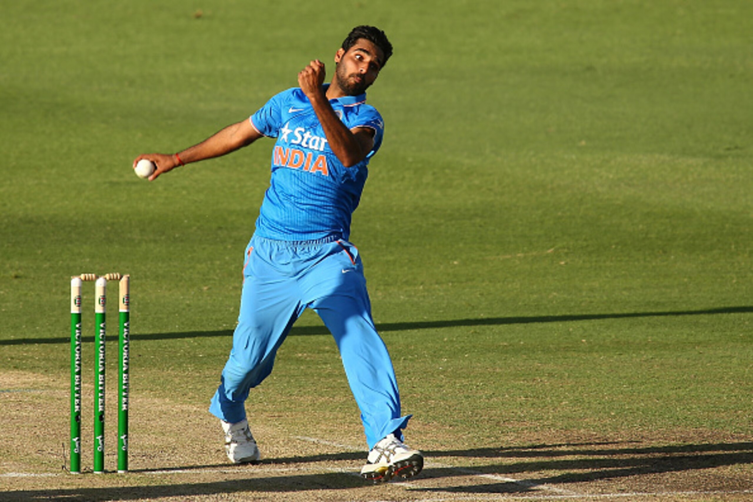 PERTH, AUSTRALIA - JANUARY 12: Bhuvneshwar Kumar of India bowls during the Victoria Bitter One Day International Series match between Australia and India at WACA on January 12, 2016 in Perth, Australia.  (Photo by Paul Kane/Getty Images)