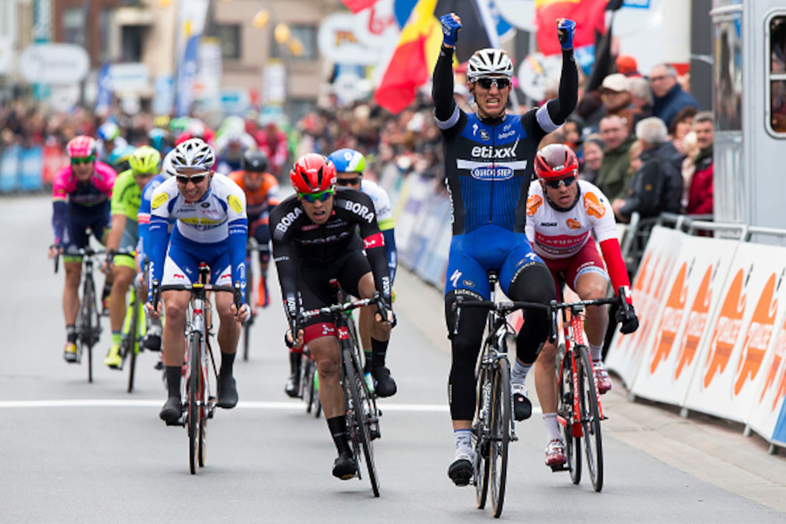 German Marcel Kittel of team Etixx - Quick-Step celebrates after winning the first part of the third and final stage of the Driedaagse De Panne - Koksijde cycling race, a 111,5km ride to and from De Panne, on March 31, 2016.  / AFP / Belga / KRISTOF VAN A