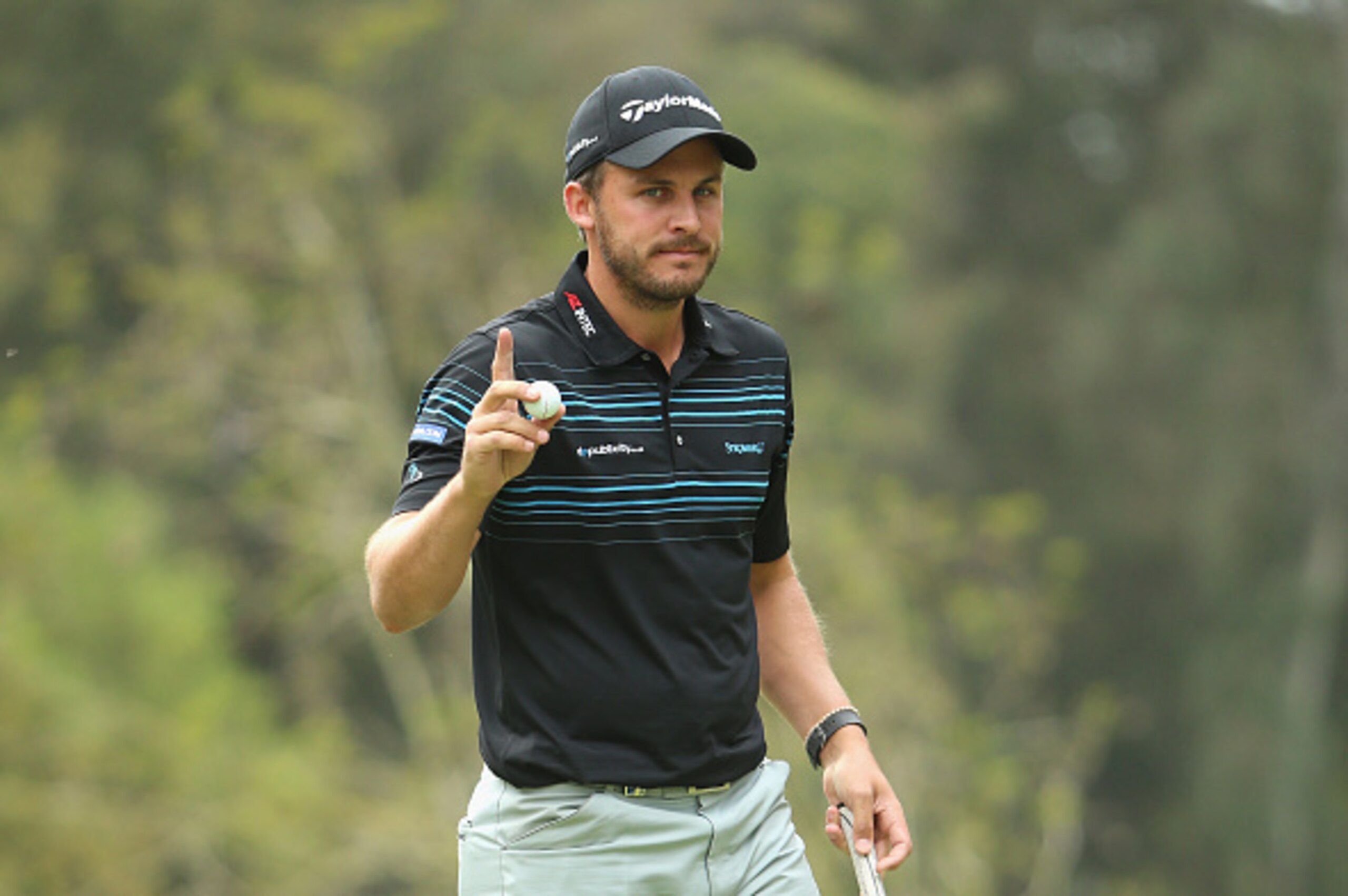 RABAT, MOROCCO - MAY 07:  Chris Hanson of England waves to the crowd after his birdie on the 18th hole during the third round of the Trophee Hassan II at Royal Golf Dar Es Salam on May 7, 2016 in Rabat, Morocco.  (Photo by Andrew Redington/Getty Images)