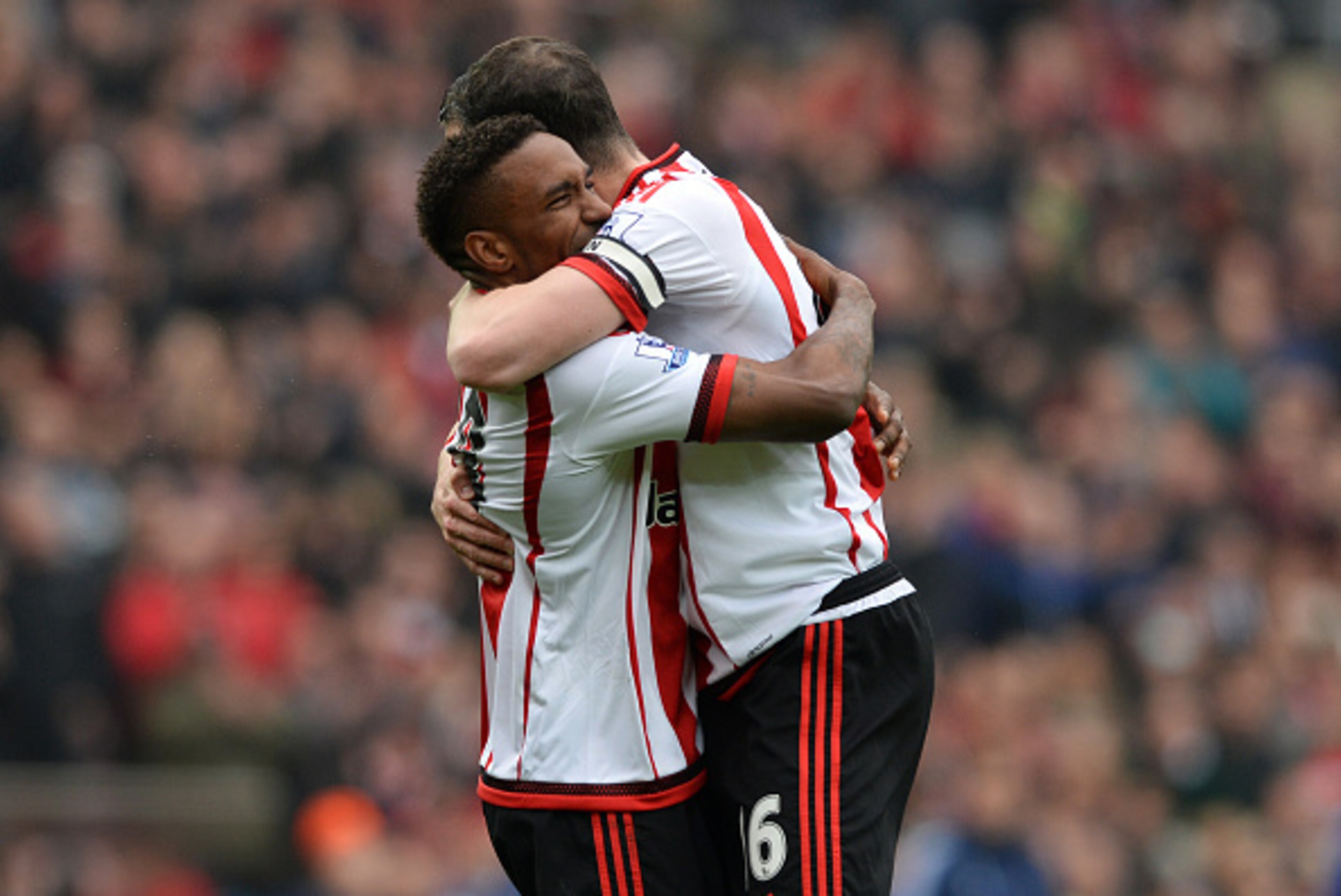 SUNDERLAND, ENGLAND - MAY 07:  Jermain Defoe (L) and John O'Shea (R) of Sunderland celebrate their team's 3-2 win in the Barclays Premier League match between Sunderland and Chelsea at the Stadium of Light on May 7, 2016 in Sunderland, United Kingdom.  (P