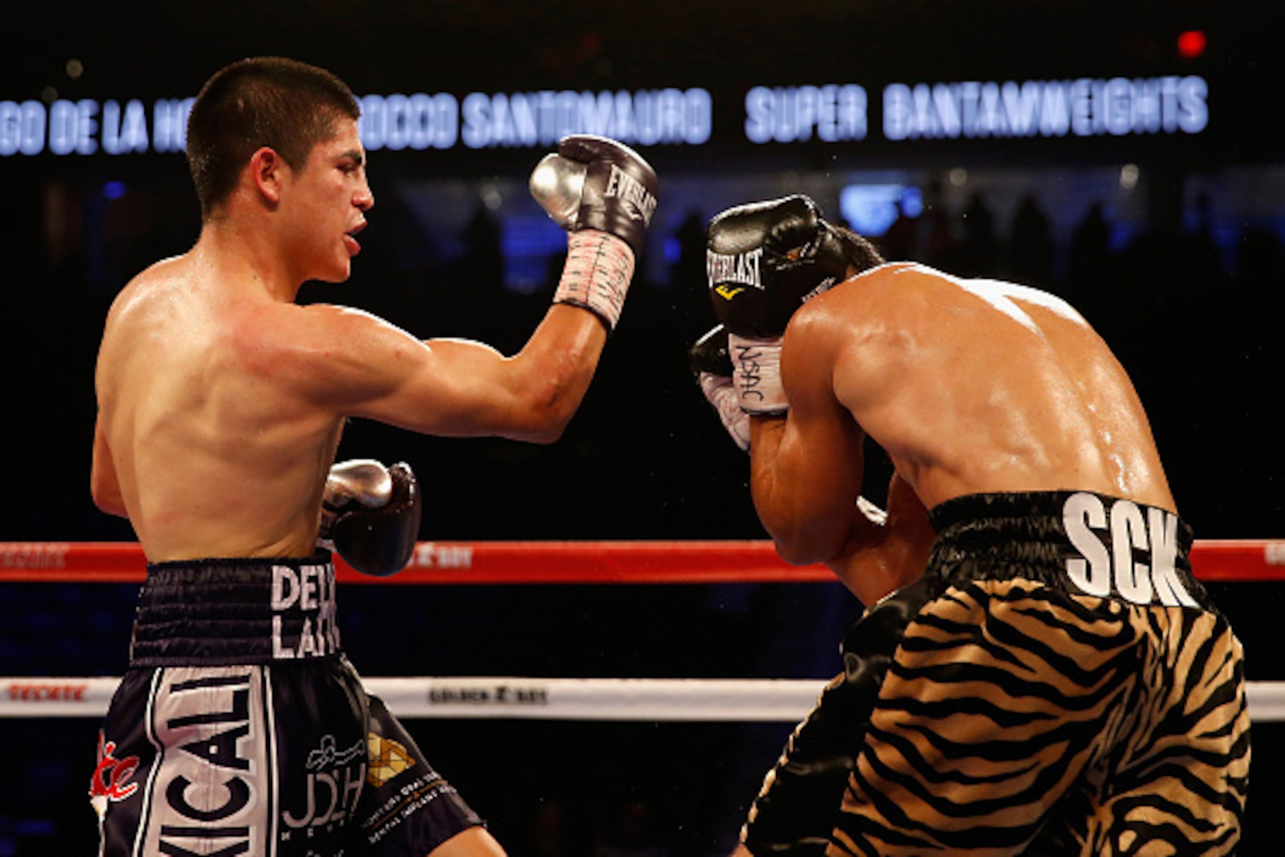 LAS VEGAS, NEVADA - MAY 07:  Diego De La Hoya (L) throws a right at Rocco Santomauro during the super bantamweight fight at T-Mobile Arena on May 7, 2016 in Las Vegas, Nevada.  (Photo by Christian Petersen/Getty Images)