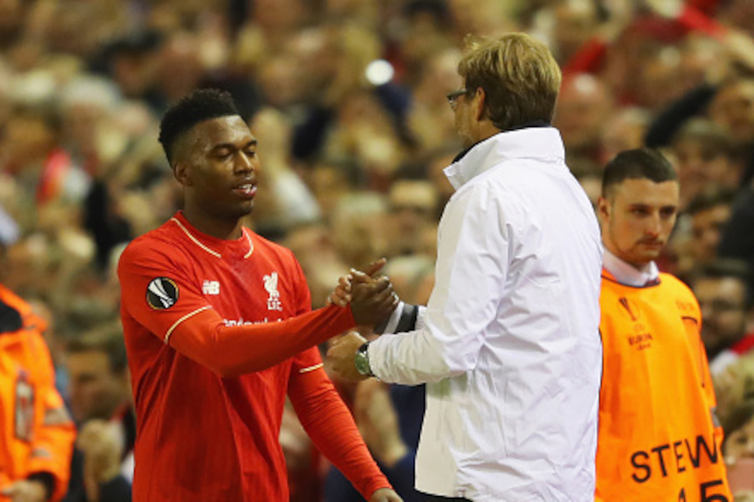 LIVERPOOL, UNITED KINGDOM - MAY 05:  Daniel Sturridge of Liverpool shakes hands with Jurgen Klopp manager of Liverpool as he is substituted during the UEFA Europa League semi final second leg match between Liverpool and Villarreal CF at Anfield on May 5, 