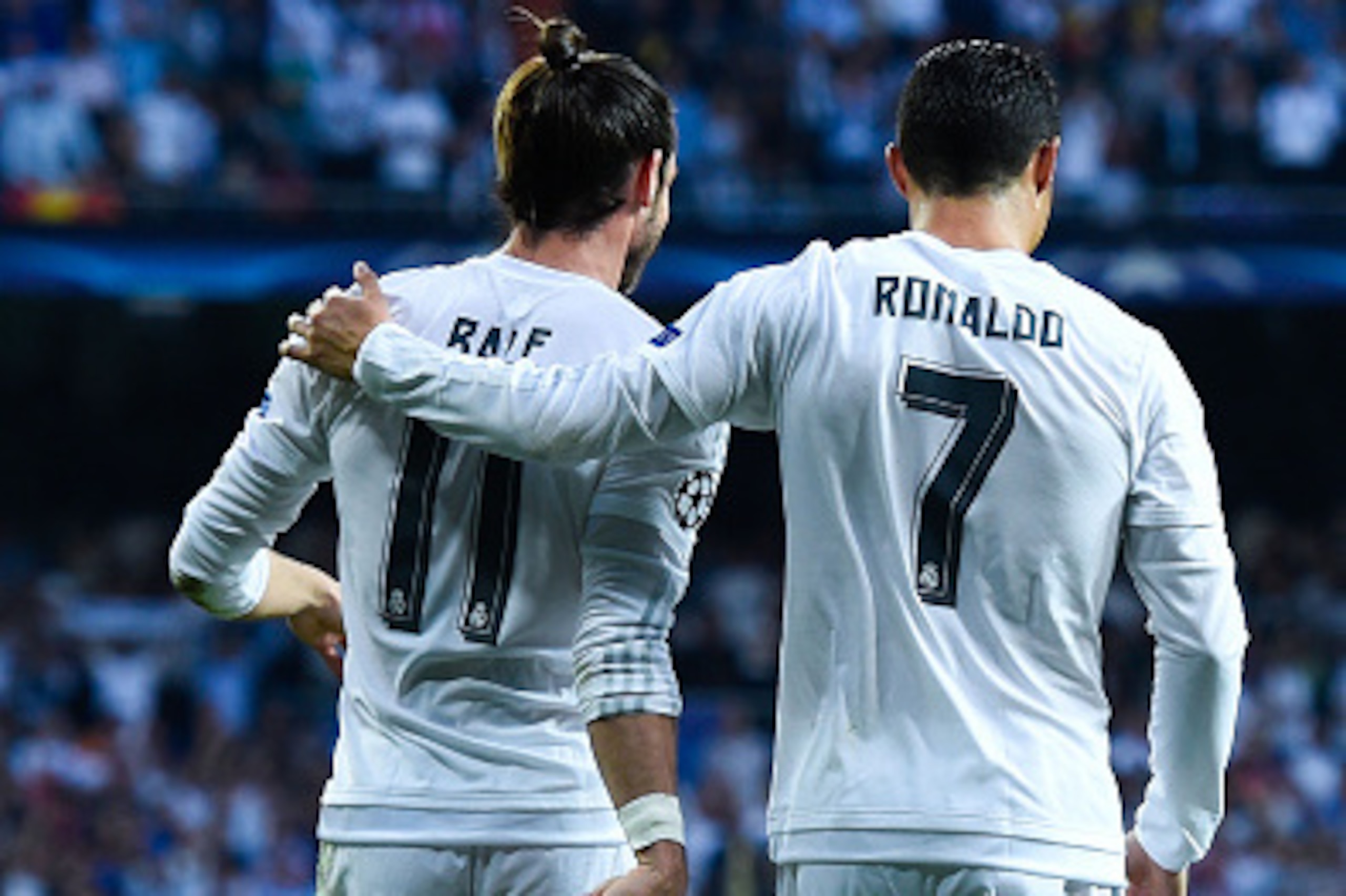 MADRID, SPAIN - MAY 04:  Gareth Bale celebrates with his teammate Cristiano Ronaldo of Real Madrid CF after scoring the opening goal during the UEFA Champions League Semi Final second leg match between Real Madrid and Manchester City FC at Estadio Santiag