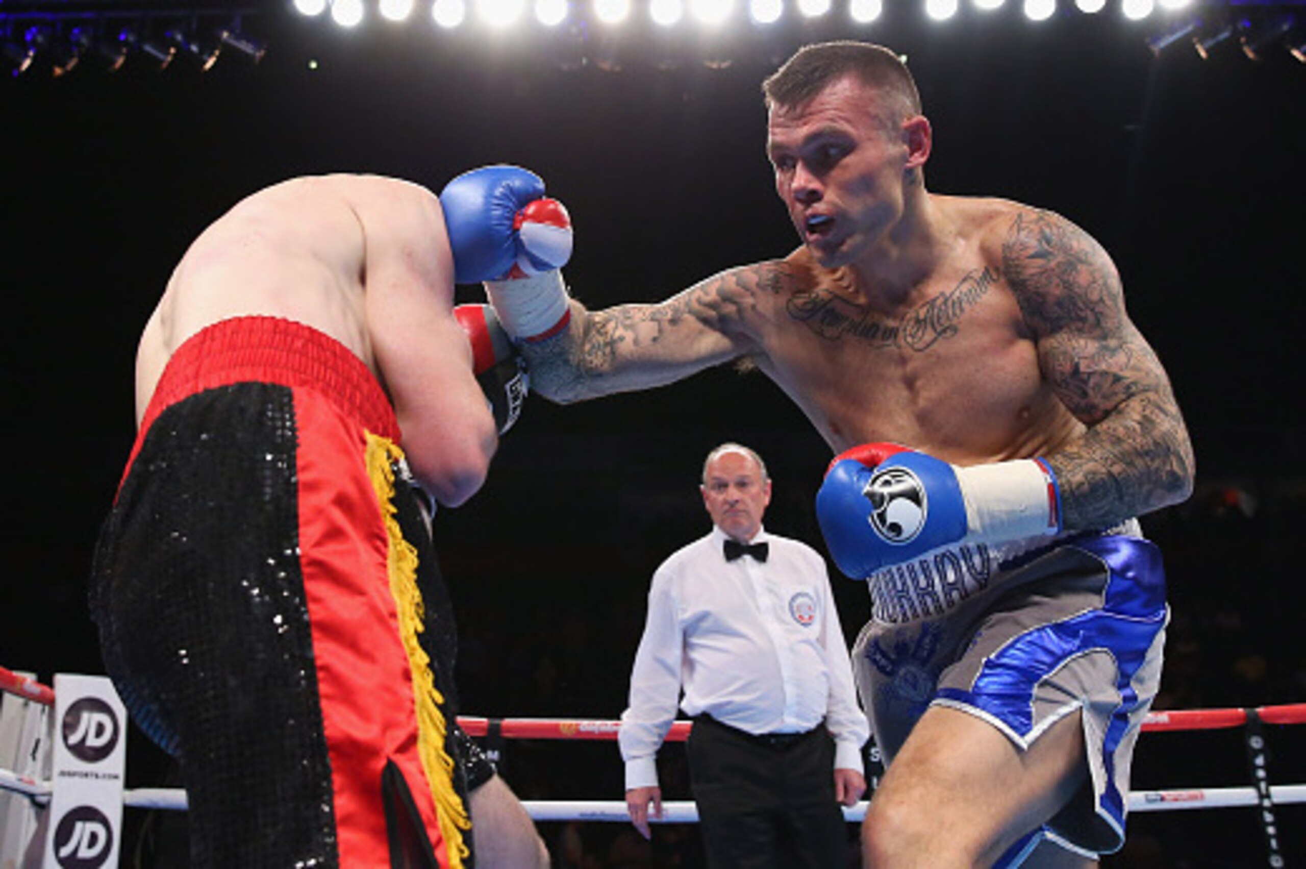 MANCHESTER, ENGLAND - MAY 07: Martin Murray lands a right shot on Cedric Spera during the Super-Middleweight Contest between Martin Murray and Cedric Spera at Manchester Arena on May 07, 2016 in Manchester, England. (Photo by Alex Livesey/Getty Images) MANCHESTER, ENGLAND - MAY 07: Martin Murray lands a right shot on Cedric Spera during the Super-Middleweight Contest between Martin Murray and Cedric Spera at Manchester Arena on May 07, 2016 in Manchester, England. (Photo by Alex Livesey/Getty Images)