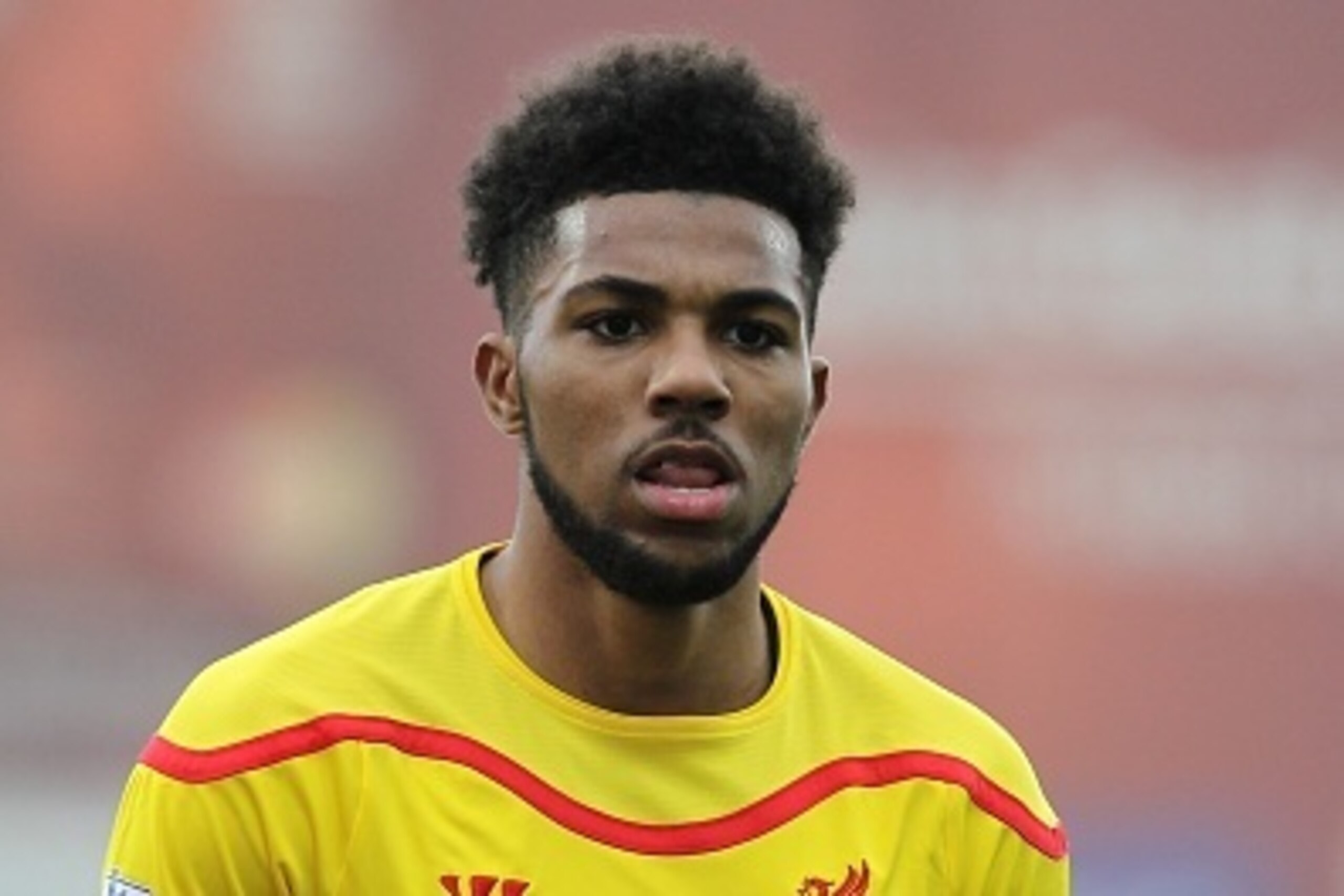 SEIXAL, PORTUGAL - FEBRUARY 24:   Liverpool's foward Jerome Sinclair in action during the UEFA Youth League match between SL Benfica and Liverpool FC on February 24, 2015 in Seixal, Portugal.  (Photo by Carlos Rodrigues/Getty Images for UEFA)