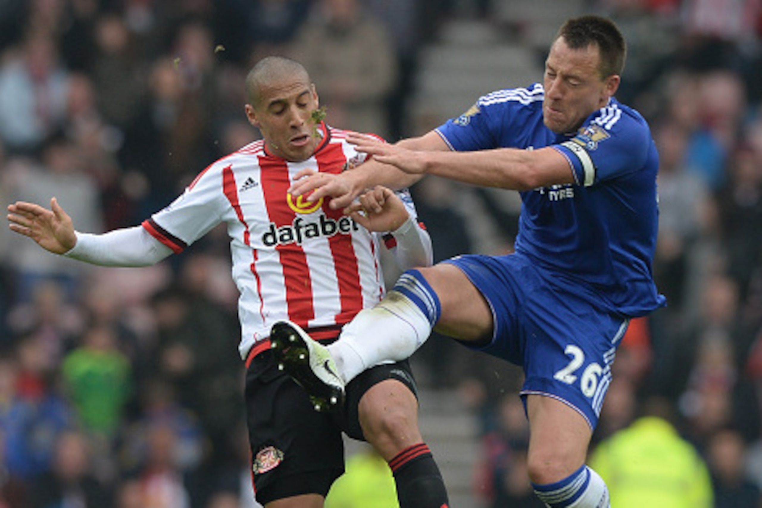 SUNDERLAND, ENGLAND - MAY 07: John Terry of Chelsea fouls Wahbi Khazri of Sunderland resutling in the second yellow card during the Barclays Premier League match between Sunderland and Chelsea at the Stadium of Light on May 7, 2016 in Sunderland, United SUNDERLAND, ENGLAND - MAY 07: John Terry of Chelsea fouls Wahbi Khazri of Sunderland resutling in the second yellow card during the Barclays Premier League match between Sunderland and Chelsea at the Stadium of Light on May 7, 2016 in Sunderland, United