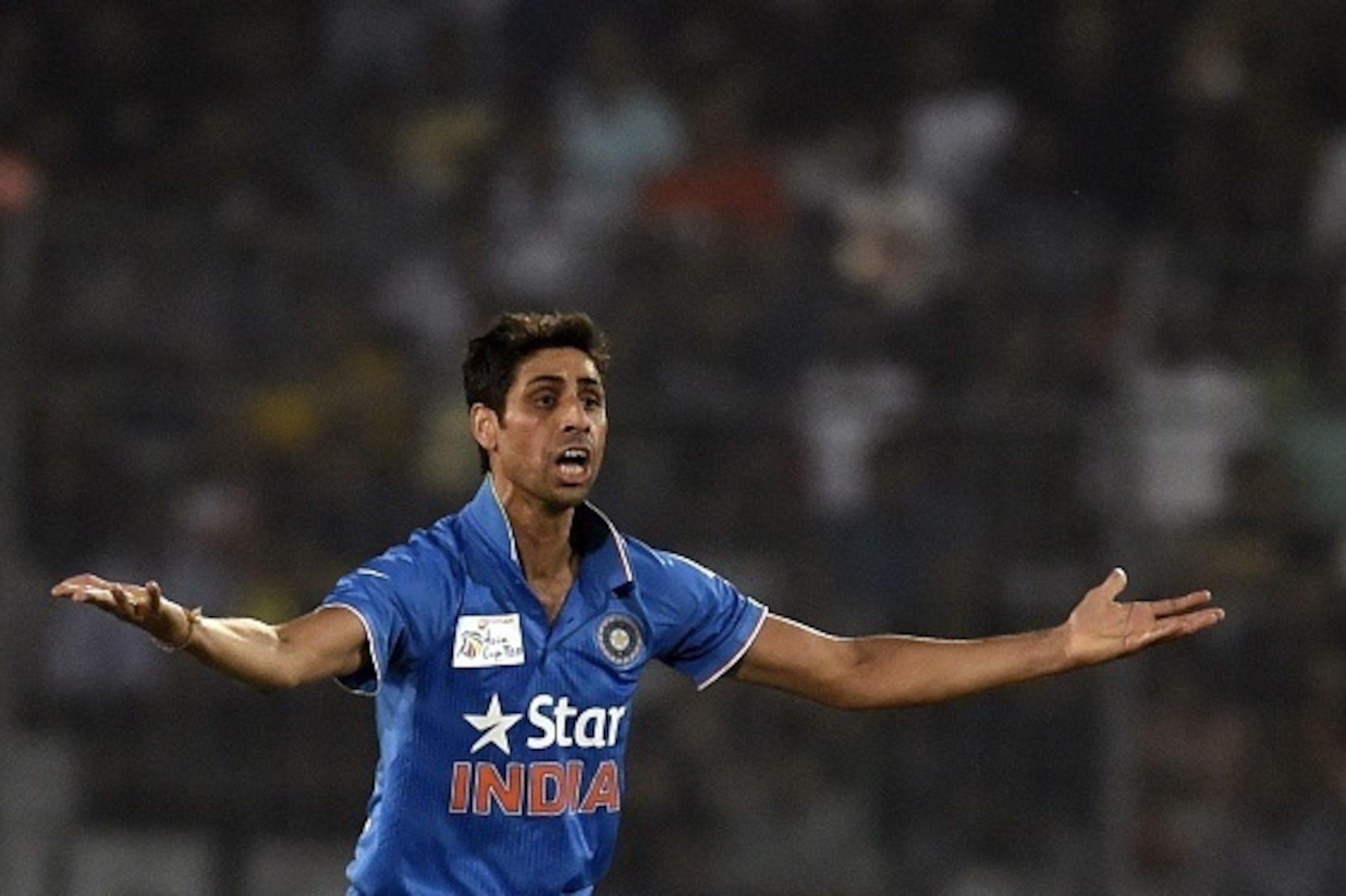 Indian cricketer Ashish Nehra unsuccessfully appeals for a Leg Before Wicket (LBW) decision against Pakistan cricketer Khurram Manzoor during the match between India and Pakistan at the Asia Cup T20 cricket tournament at the Sher-e-Bangla National Cricket
