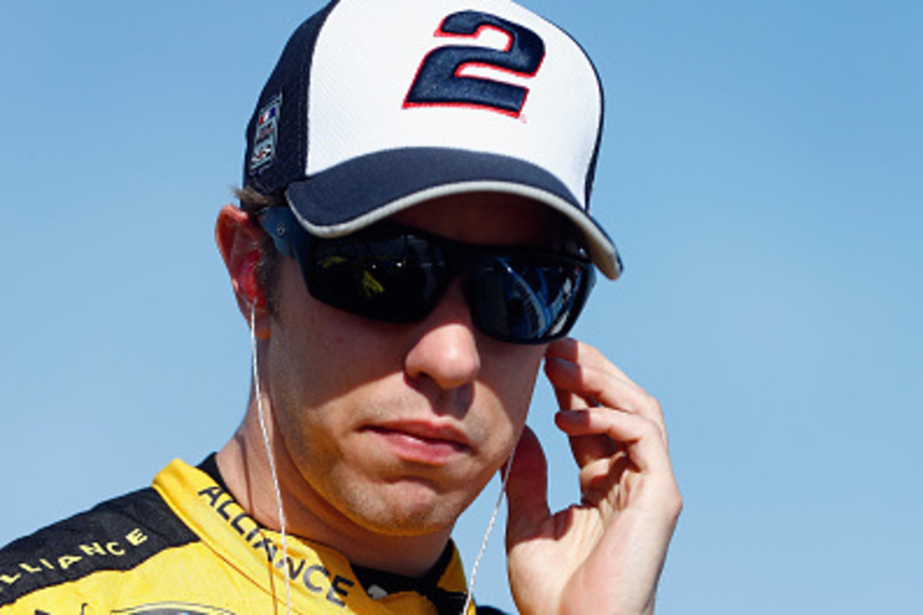 KANSAS CITY, KS - MAY 06:  Brad Keselowski, driver of the #2 Alliance Truck Parts Ford, stands on the grid during qualifying for the NASCAR Sprint Cup Series Go Bowling 400 at Kansas Speedway on May 6, 2016 in Kansas City, Kansas.  (Photo by Jamie Squire/