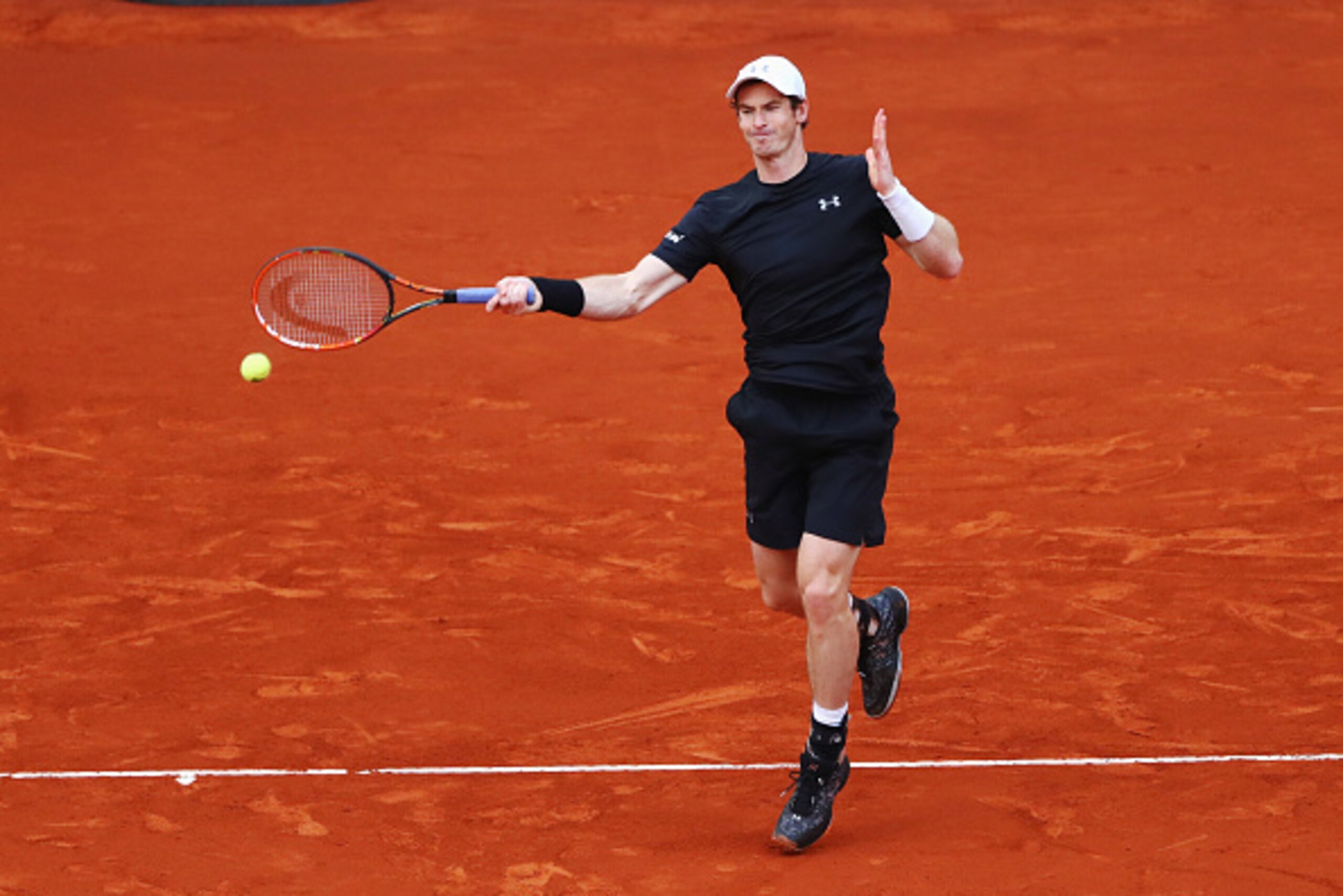 MADRID, SPAIN - MAY 08:  Andy Murray of Great Britain plays a forehand during the Men's singles final against Novak Djokovic of Serbia on day nine of Mutua Madrid Open at La Caja Magica on May 8, 2016 in Madrid, Spain.  (Photo by Julian Finney/Getty Image
