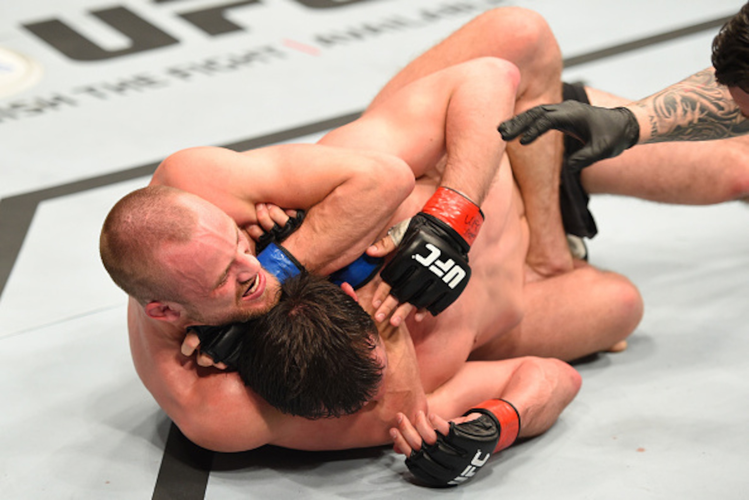 ROTTERDAM, NETHERLANDS - MAY 08:  (L-R) Gunnar Nelson submits Albert Tumenov in their welterweight bout during the UFC Fight Night event at Ahoy Rotterdam on May 8, 2016 in Rotterdam, Netherlands. (Photo by Josh Hedges/Zuffa LLC/Zuffa LLC via Getty Images