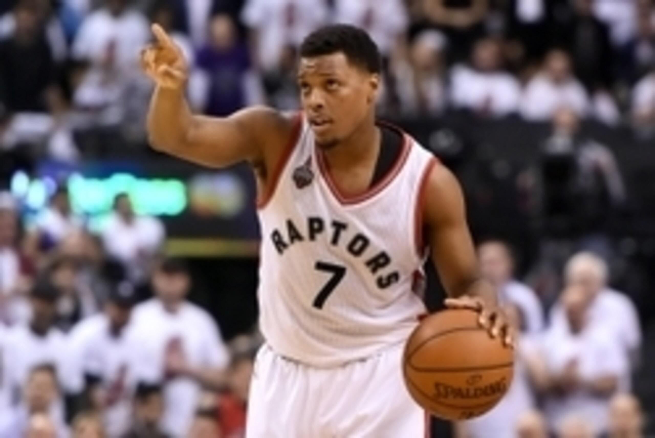 May 5, 2016; Toronto, Ontario, CAN;   Toronto Raptors guard Kyle Lowry (7) gestures as he dribbles the ball up court against Miami Heat in game two of the second round of the NBA Playoffs at Air Canada Centre. The Raptors won 96-92. Mandatory Credit: Dan