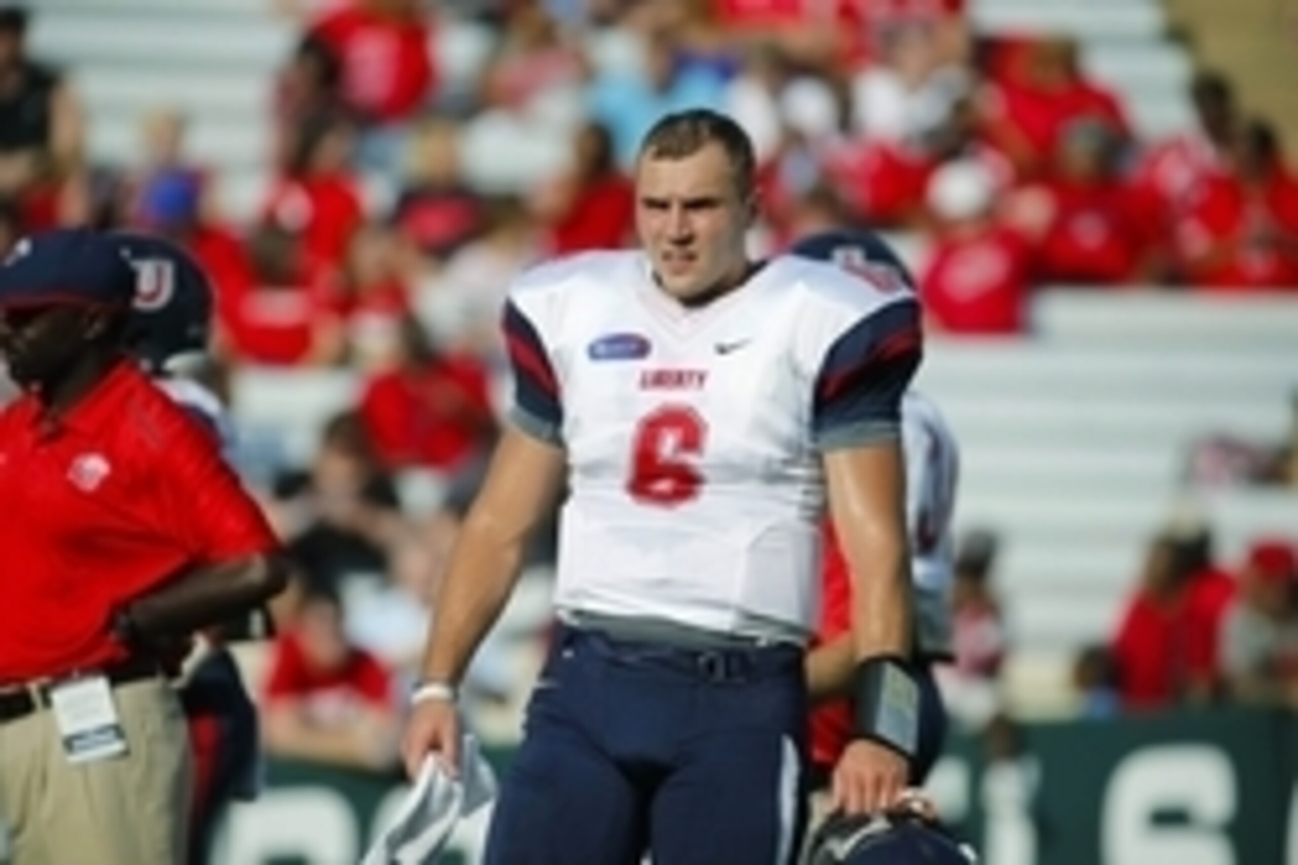 Aug 30, 2014; Chapel Hill, NC, USA; Liberty Flames quarterback Josh Woodrum (6) looks on before the start of the game against the North Carolina Tar Heels at Kenan Memorial Stadium. Mandatory Credit: James Guillory-USA TODAY Sports