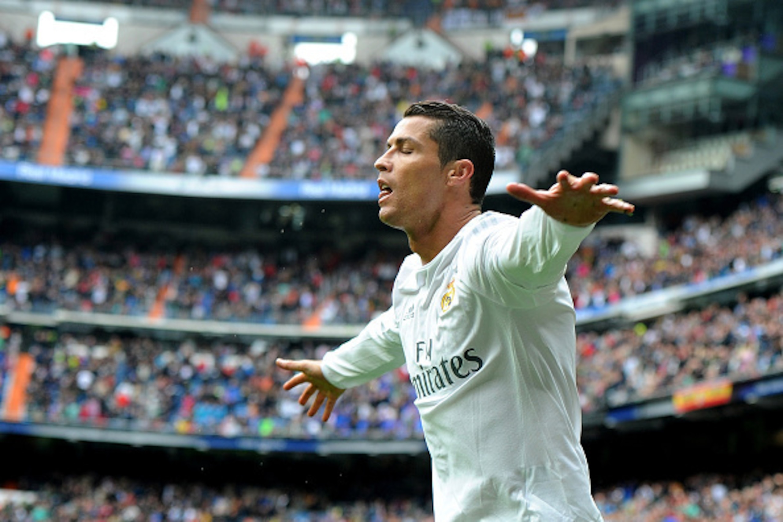 MADRID, SPAIN - MAY 08:  Cristiano Ronaldo of Real Madrid celebrates after scoring his team's 3rd goal during the La Liga match between Real Madrid CF and Valencia CF at Estadio Santiago Bernabeu on May 8, 2016 in Madrid, Spain.  (Photo by Denis Doyle/Get