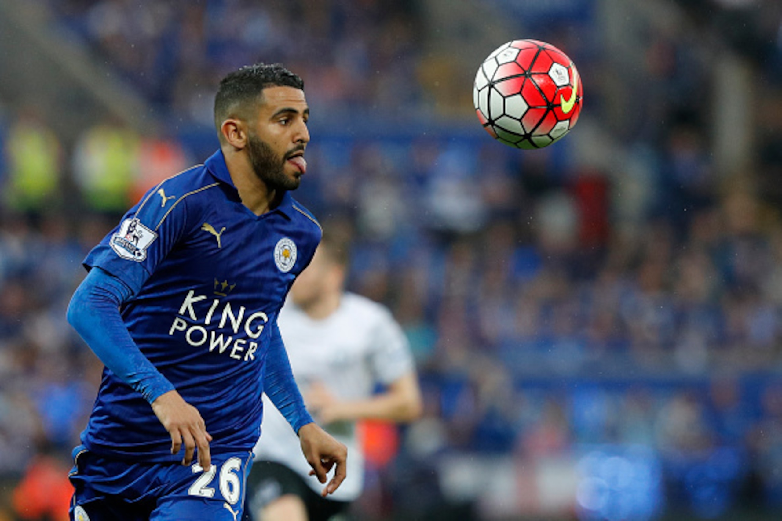 Leicester City's Algerian midfielder Riyad Mahrez watches the ball during the English Premier League football match between Leicester City and Everton at King Power Stadium in Leicester, central England on May 7, 2016. / AFP / ADRIAN DENNIS / RESTRICTED T