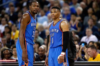 OAKLAND, CA - MARCH 03:  Kevin Durant #35 and Russell Westbrook #0 of the Oklahoma City Thunder talk to head coach Billy Donovan during their game against the Golden State Warriors at ORACLE Arena on March 3, 2016 in Oakland, California.  NOTE TO USER: Us