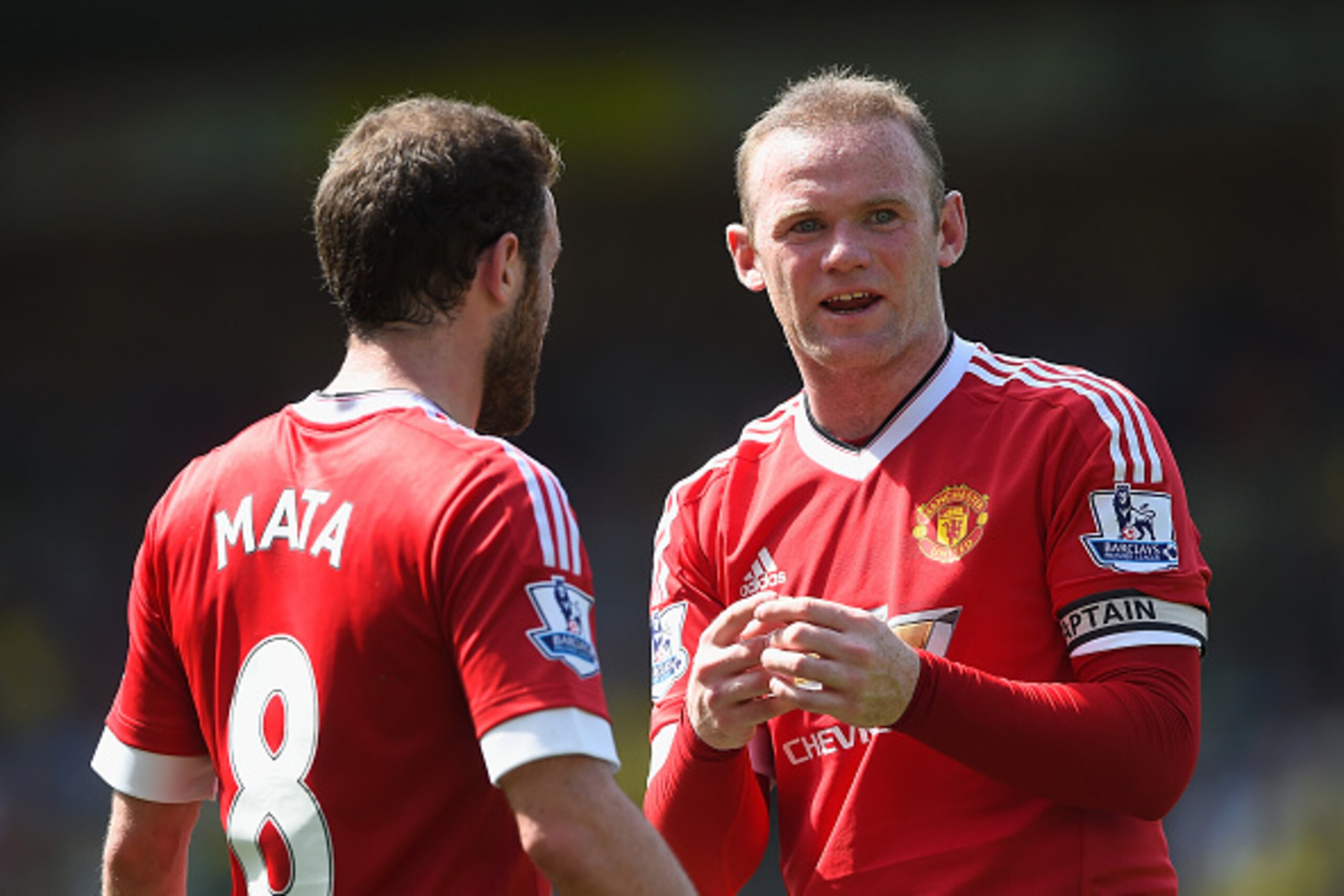 NORWICH, ENGLAND - MAY 07:  Wayne Rooney of Manchester United talks to Juan Mata during the Barclays Premier League match between Norwich City and Manchester United at Carrow Road on May 07, 2016 in Norwich, England.  (Photo by Mike Hewitt/Getty Images)