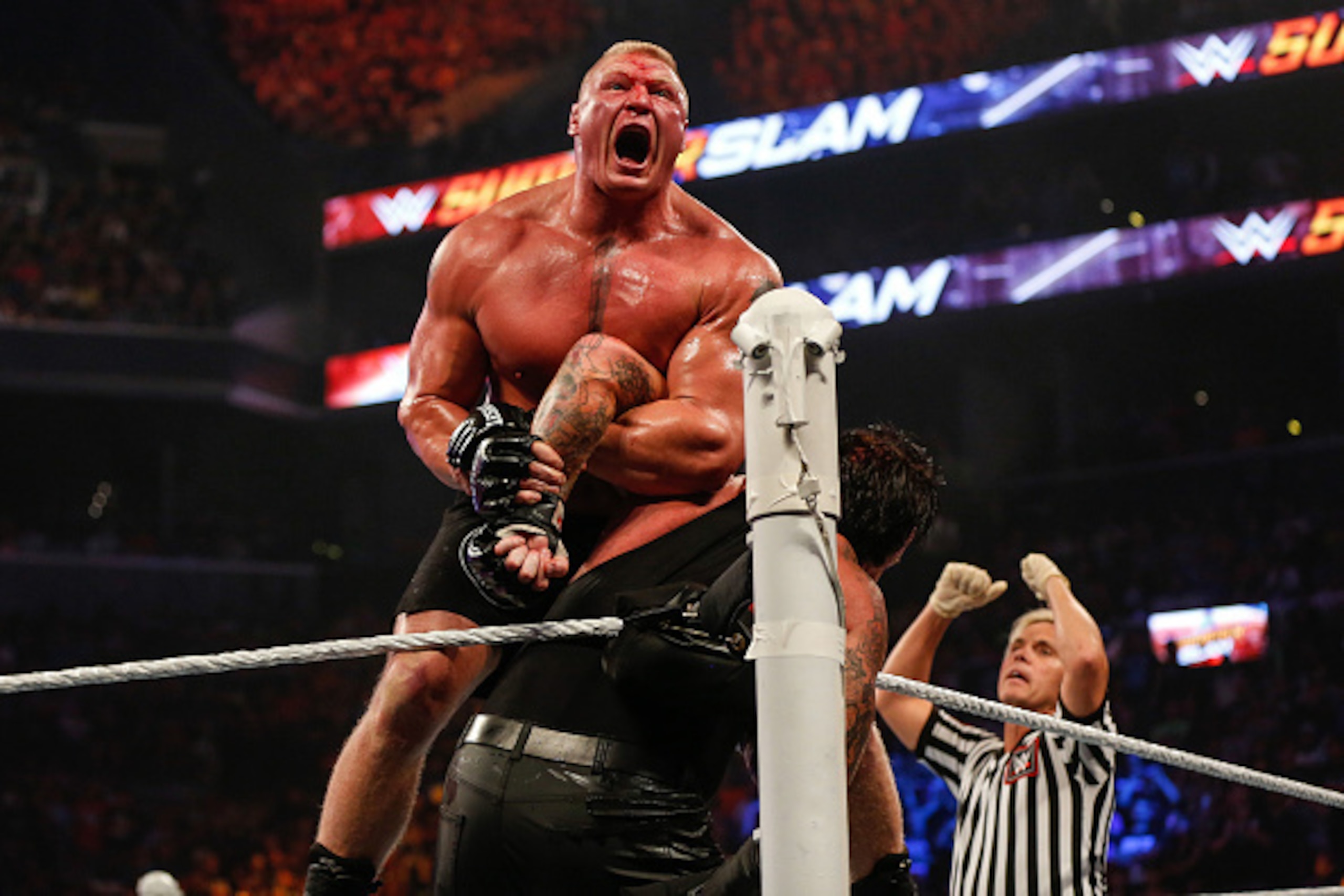 NEW YORK, NY - AUGUST 23:  Brock Lesnar and The Undertaker battle it out at the WWE SummerSlam 2015 at Barclays Center of Brooklyn on August 23, 2015 in New York City.  (Photo by JP Yim/Getty Images)