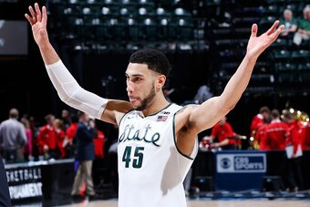 INDIANAPOLIS, IN - MARCH 12: Denzel Valentine #45 of the Michigan State Spartans celebrates after defeating the Maryland Terrapins in the semifinals of the Big Ten Basketball Tournament at Bankers Life Fieldhouse on March 12, 2016 in Indianapolis, Indiana