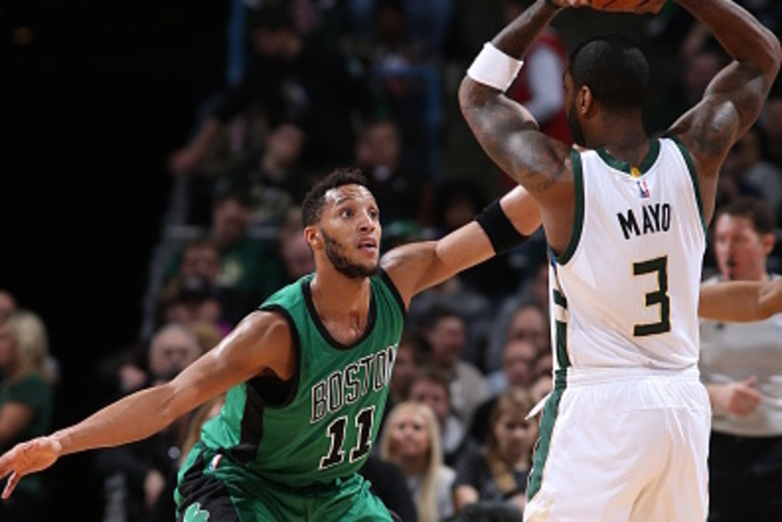MILWAUKEE, WI - FEBRUARY 9:  Evan Turner #11 of the Boston Celtics defends against O.J. Mayo #3 of the Milwaukee Bucks on February 9, 2016 at the BMO Harris Bradley Center in Milwaukee, Wisconsin. NOTE TO USER: User expressly acknowledges and agrees that,