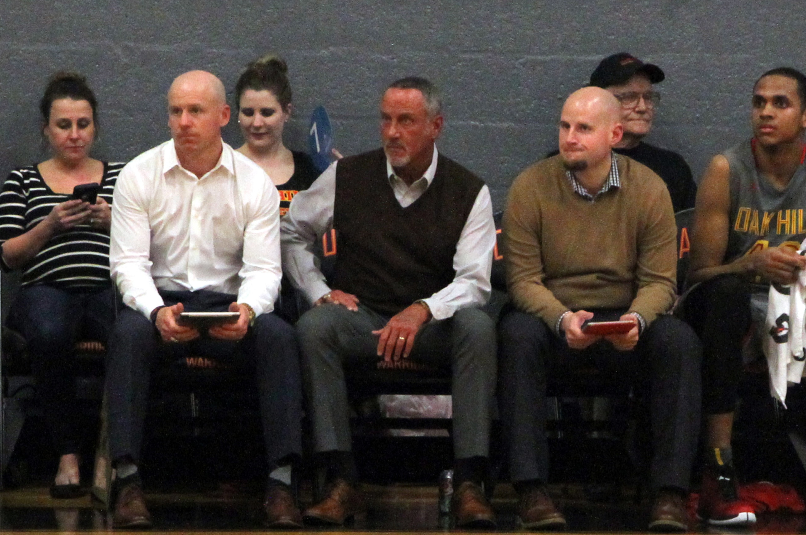 Steve Smith, second from left, during an Oak Hill home game.