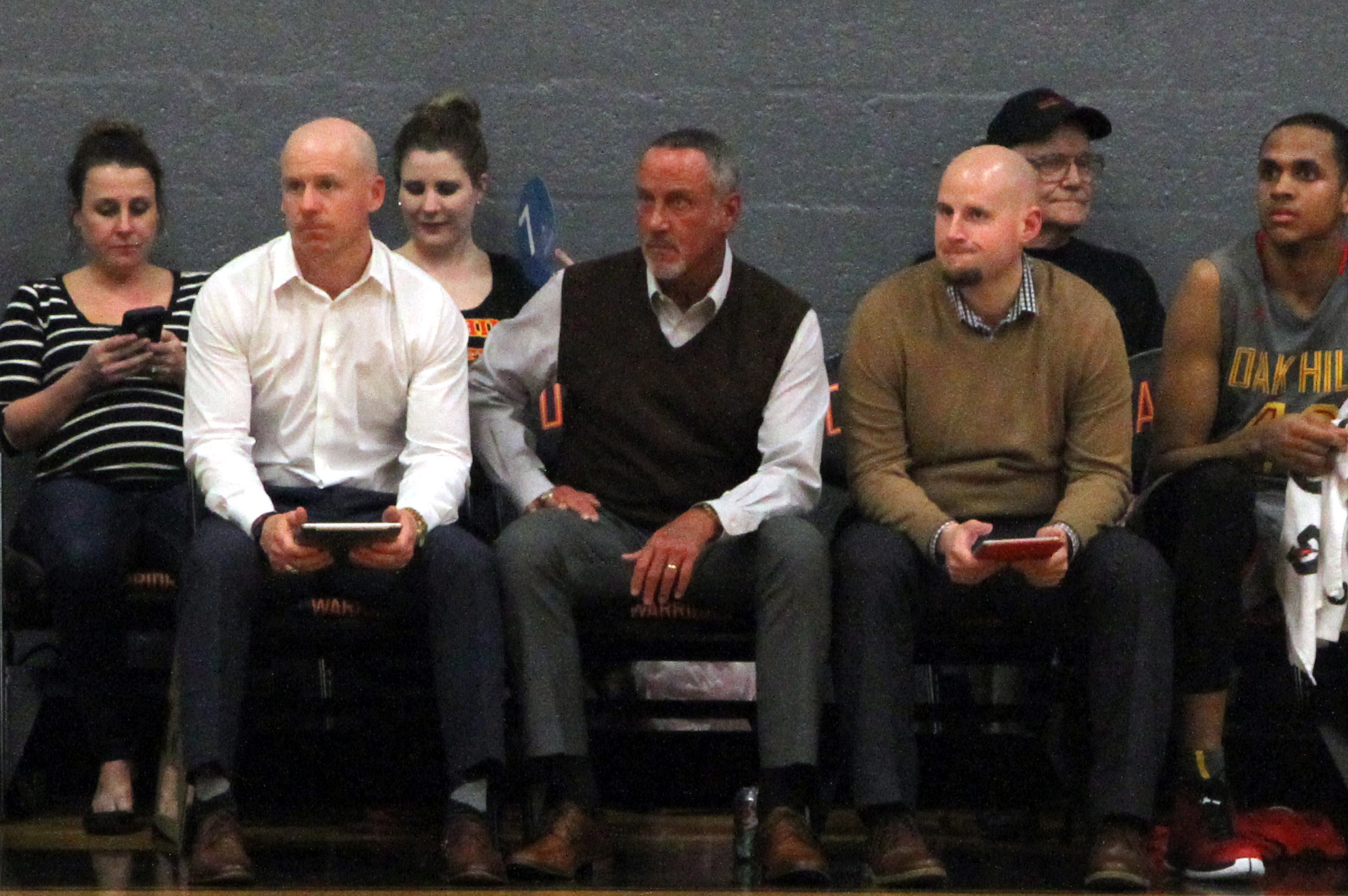 Steve Smith, second from left, during an Oak Hill home game.